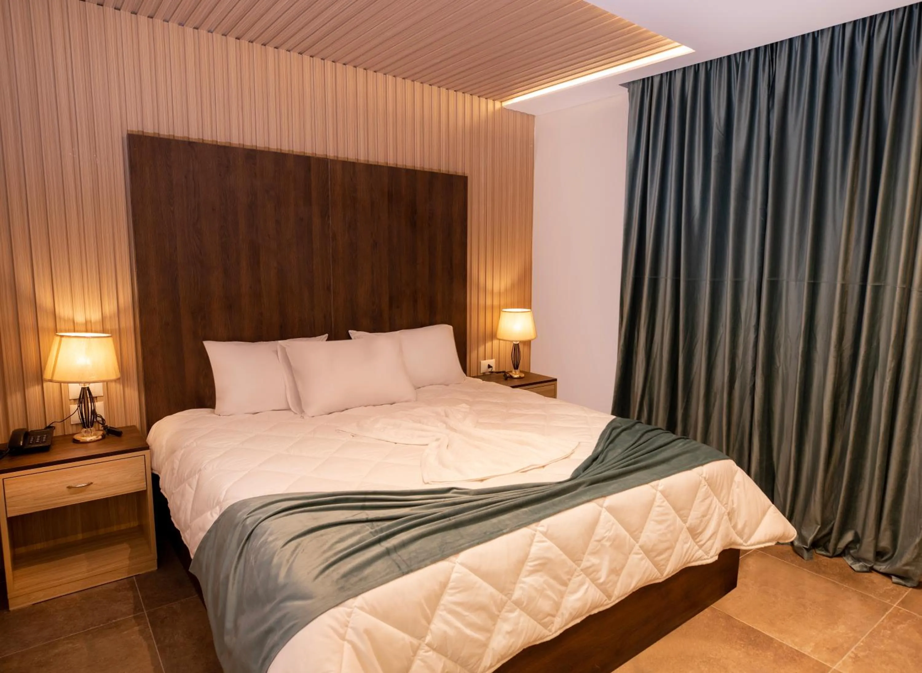 Bed in Blue Pyramids Eyes Hotel