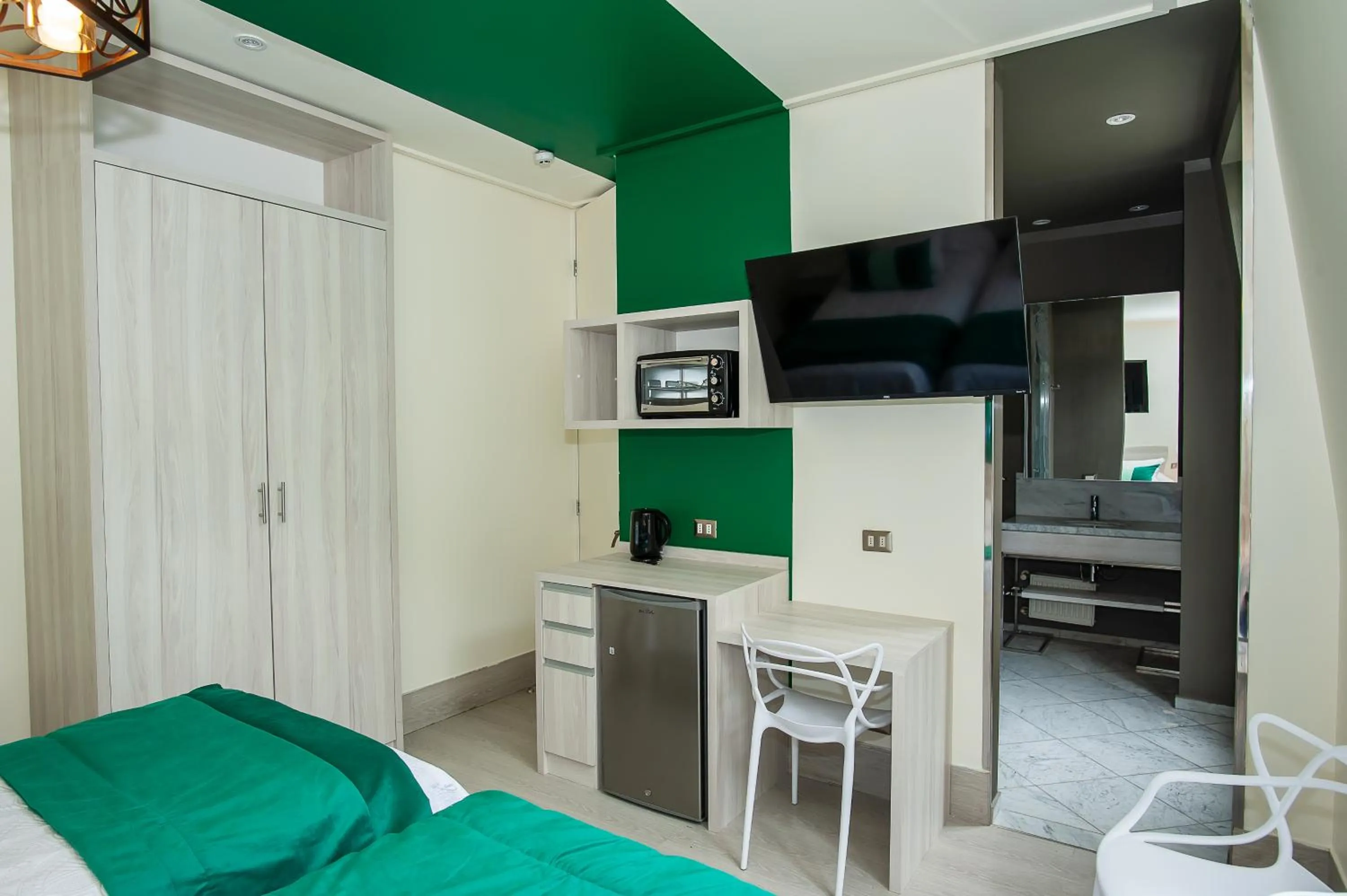 Kitchen or kitchenette, Bed in Casa Esmeralda