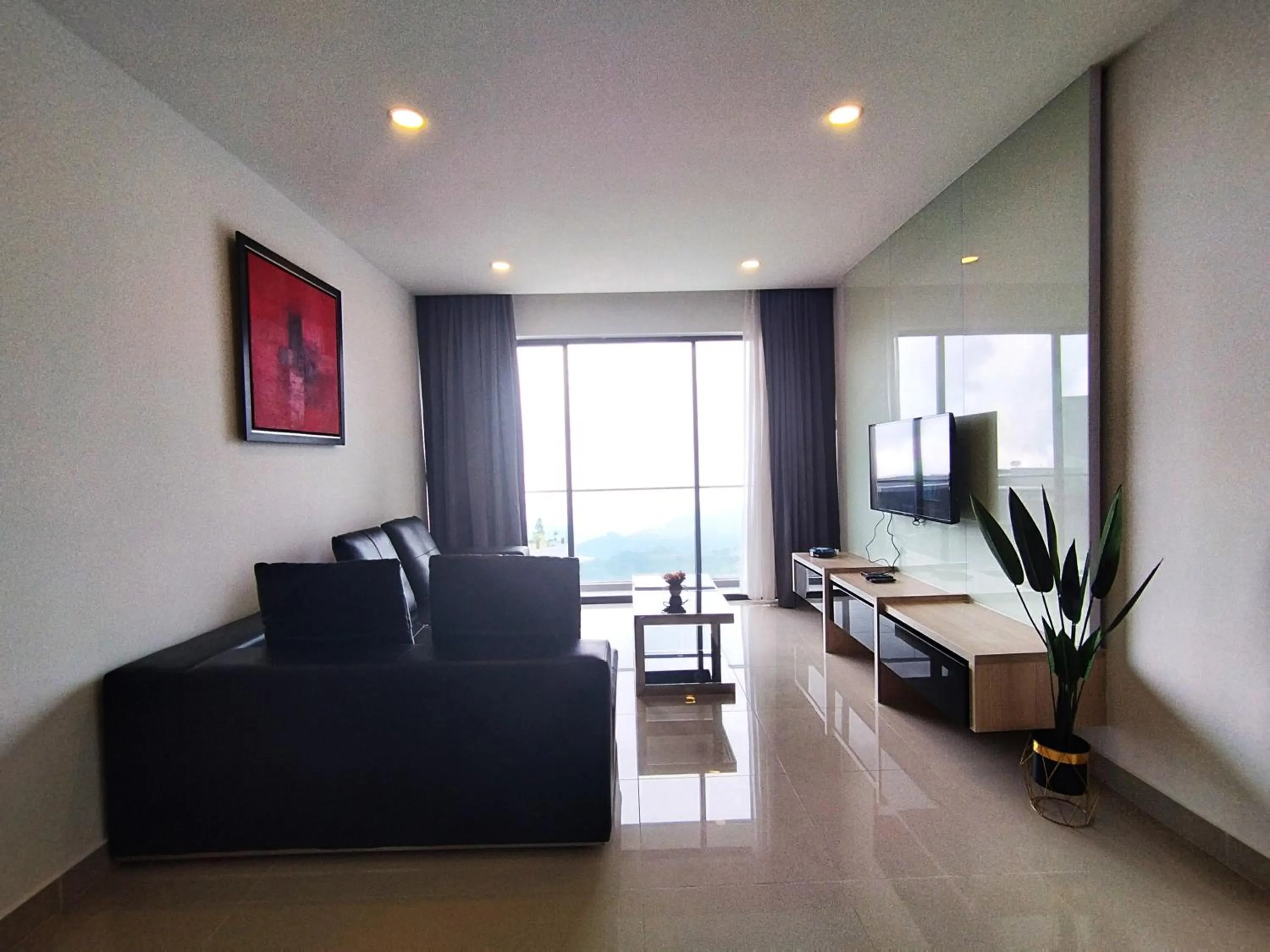 Living room in GENTING FoggyCold StayCation AT Ion Delemen By HAPYHOME