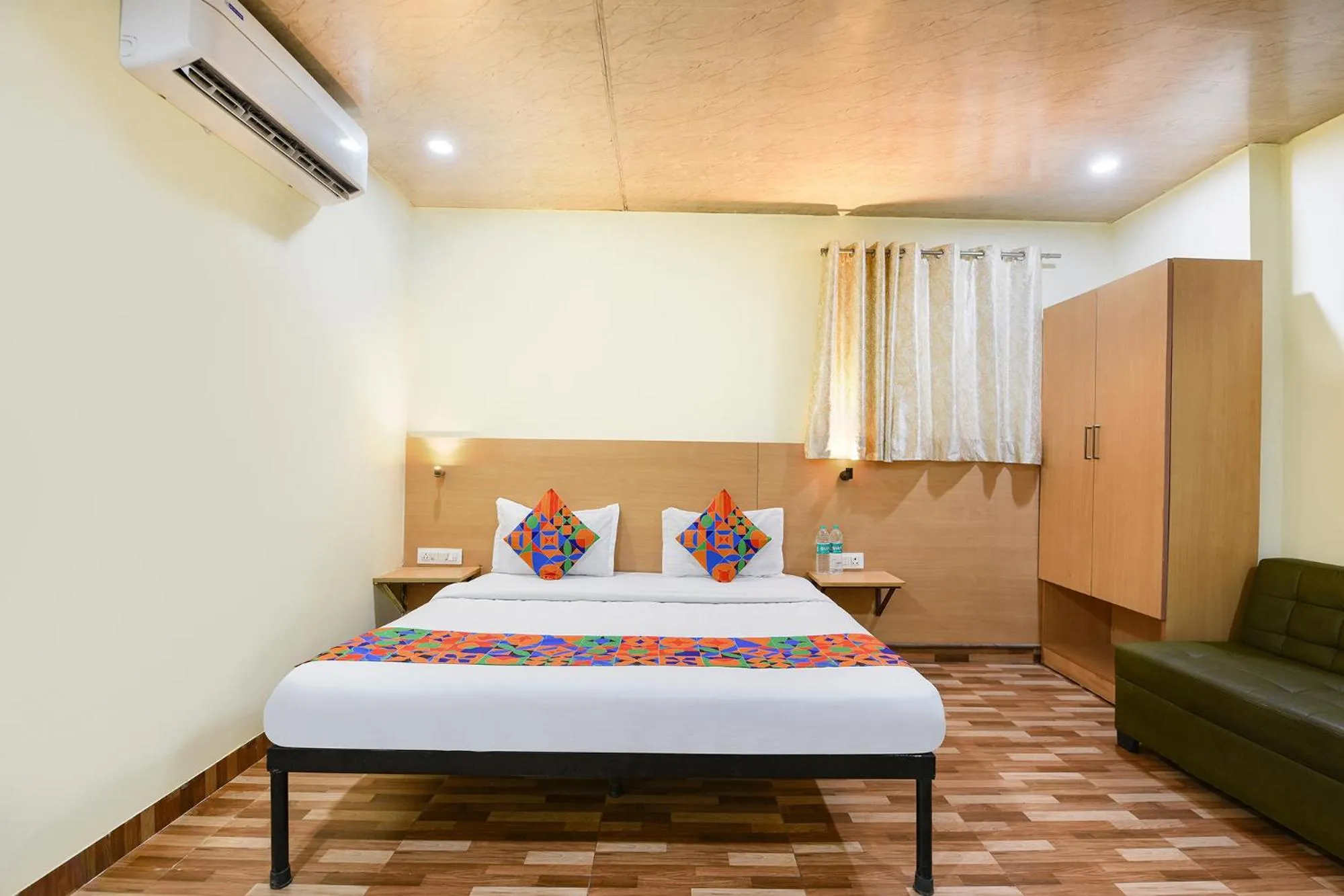 Bed in FabHotel Royal Reena Residency