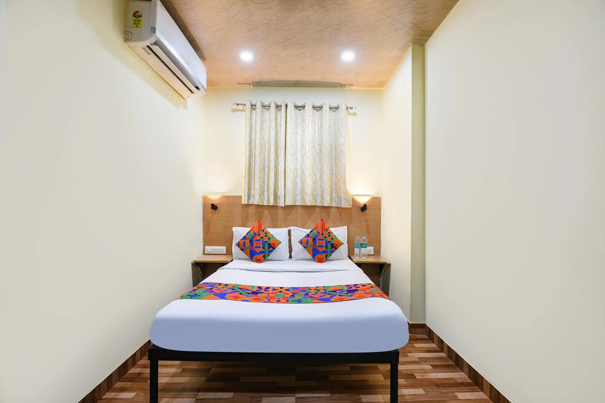 Bed in FabHotel Royal Reena Residency