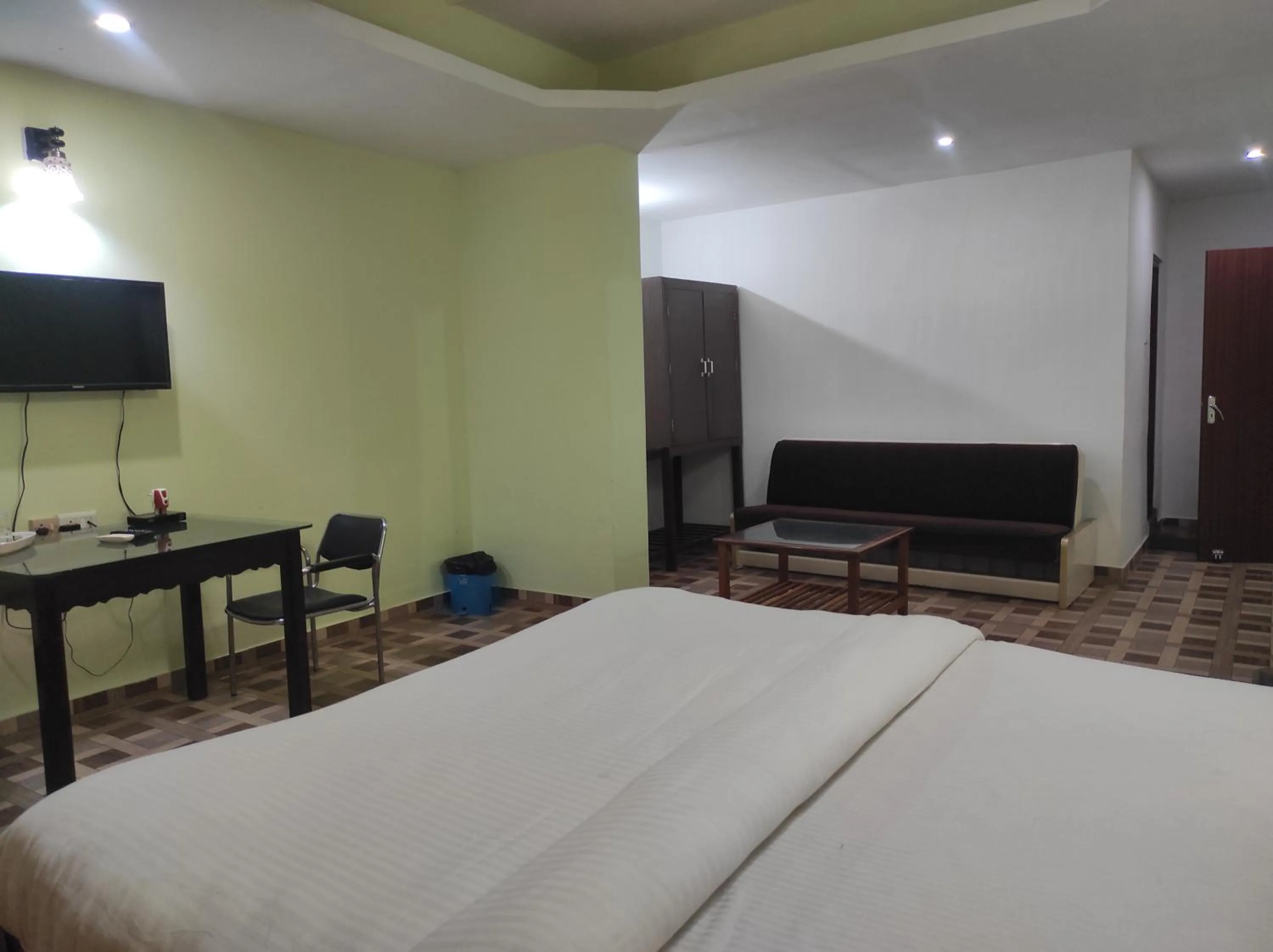 Bed in Hotel Sanjivani Heritage Top Best Budget Hotels in Dibrugarh, Assam