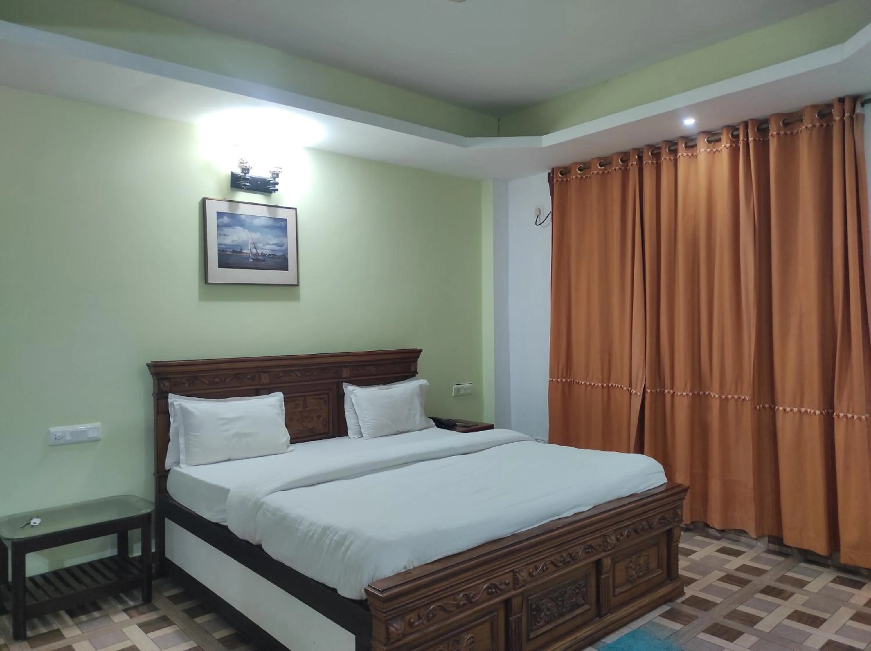 Bed in Hotel Sanjivani Heritage Top Best Budget Hotels in Dibrugarh, Assam