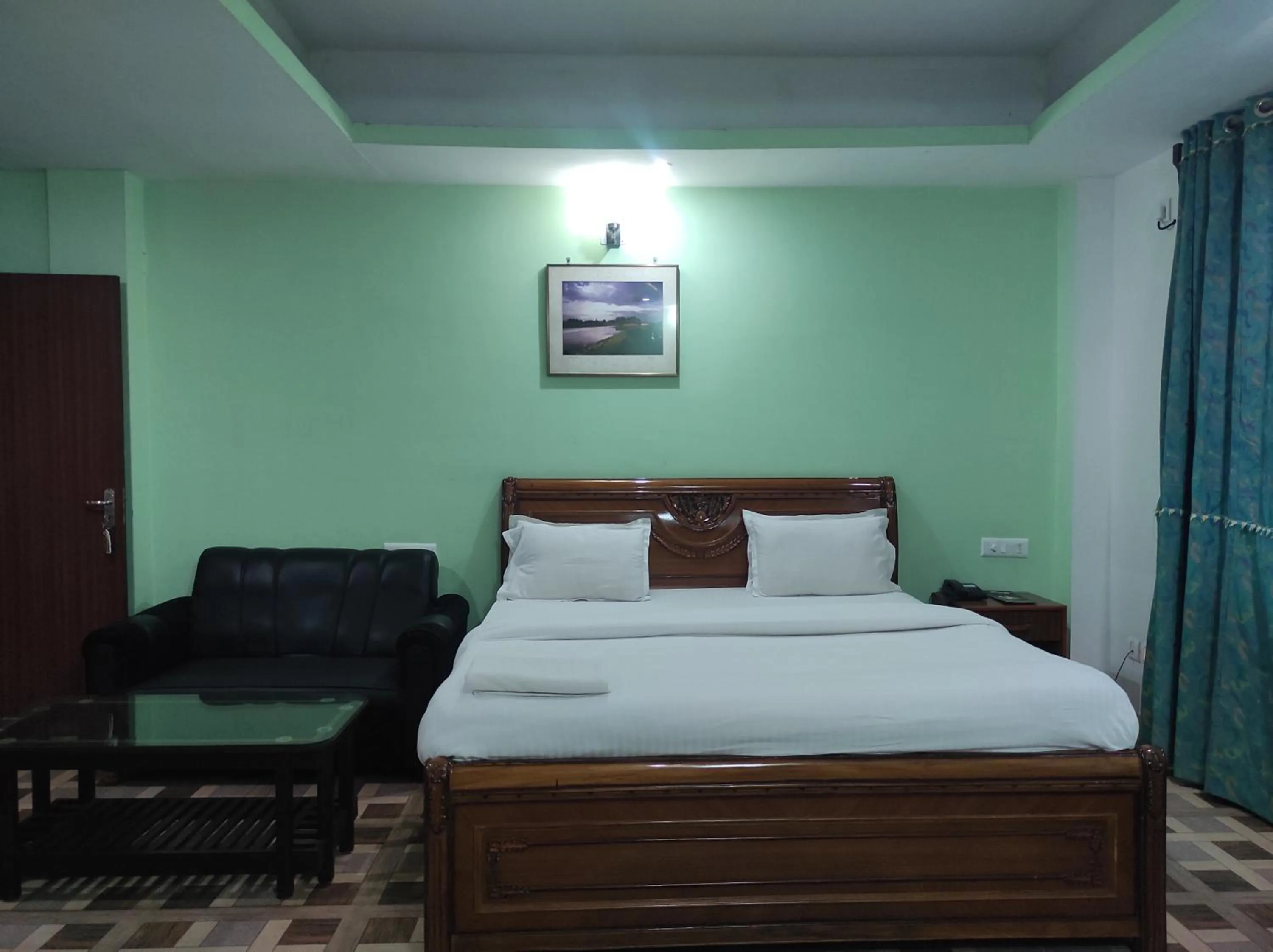 Bed in Hotel Sanjivani Heritage Top Best Budget Hotels in Dibrugarh, Assam