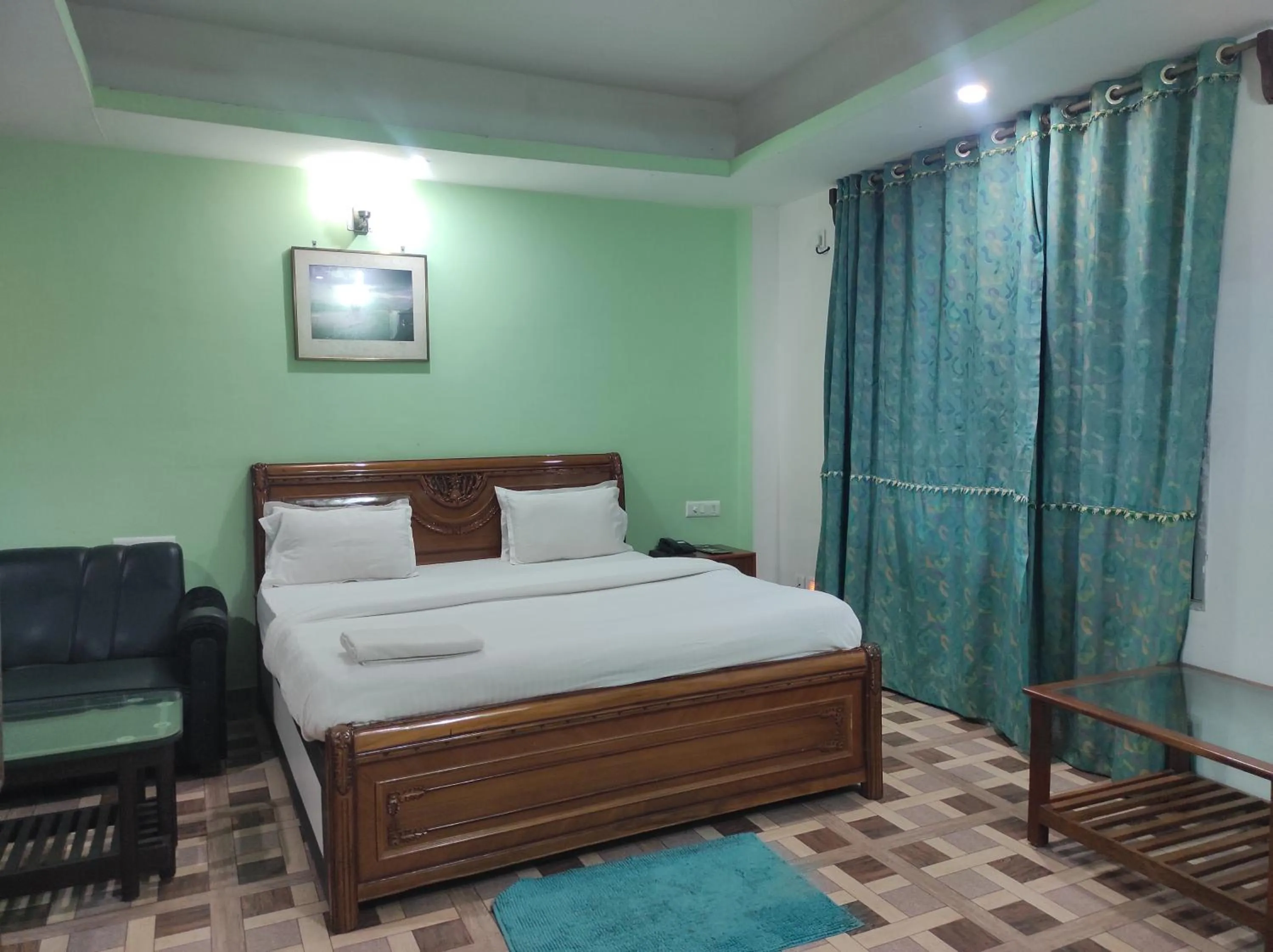 Bed in Hotel Sanjivani Heritage Top Best Budget Hotels in Dibrugarh, Assam