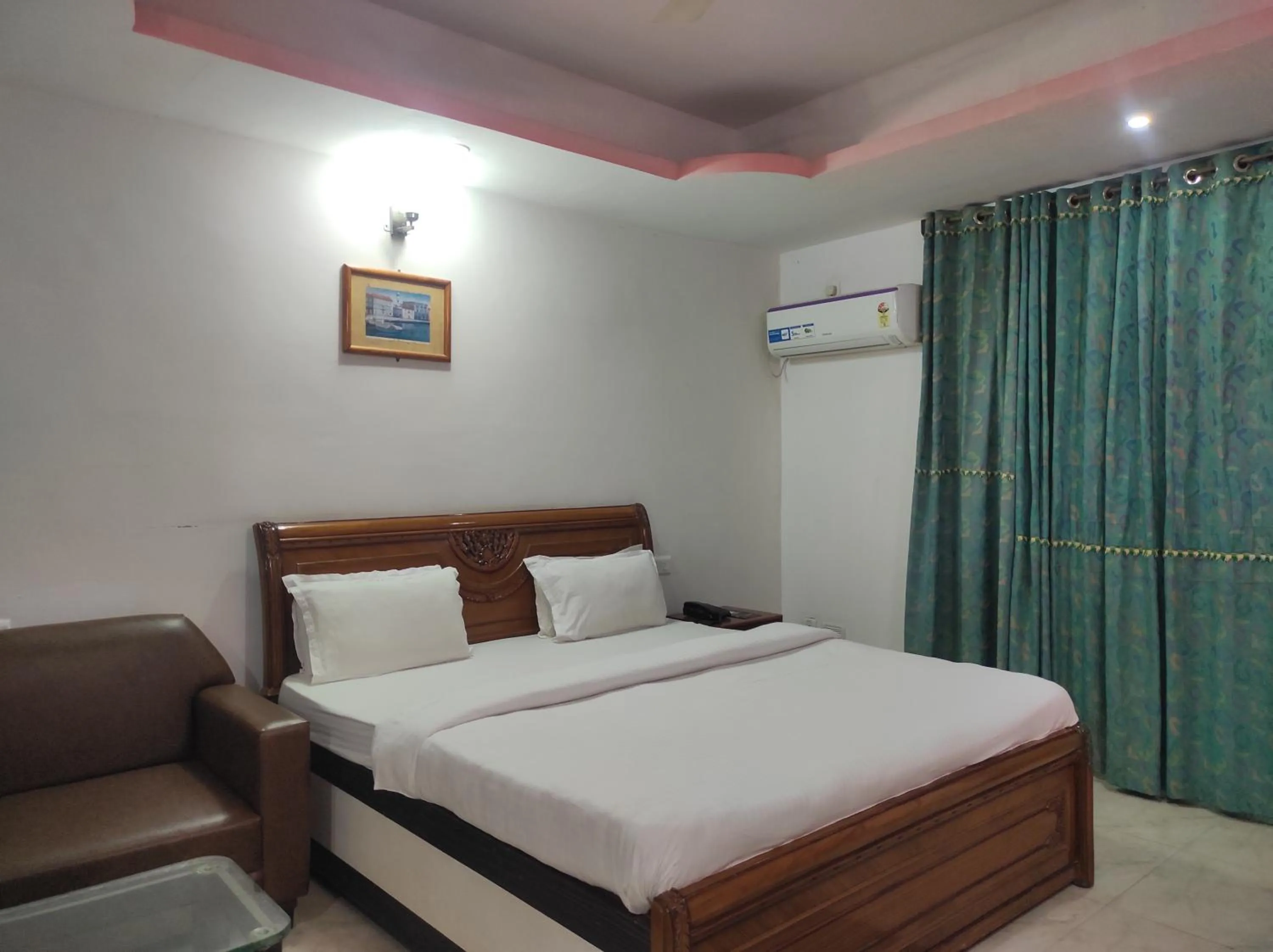 Bed in Hotel Sanjivani Heritage Top Best Budget Hotels in Dibrugarh, Assam