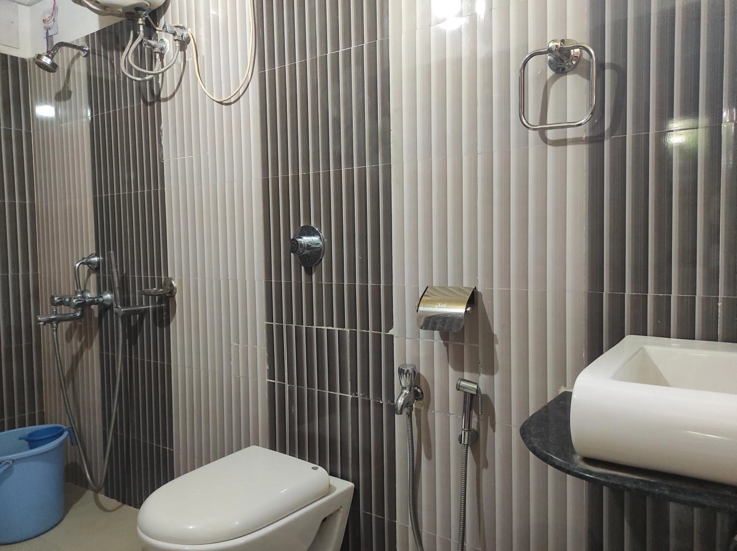 Shower in Hotel Sanjivani Heritage Top Best Budget Hotels in Dibrugarh, Assam