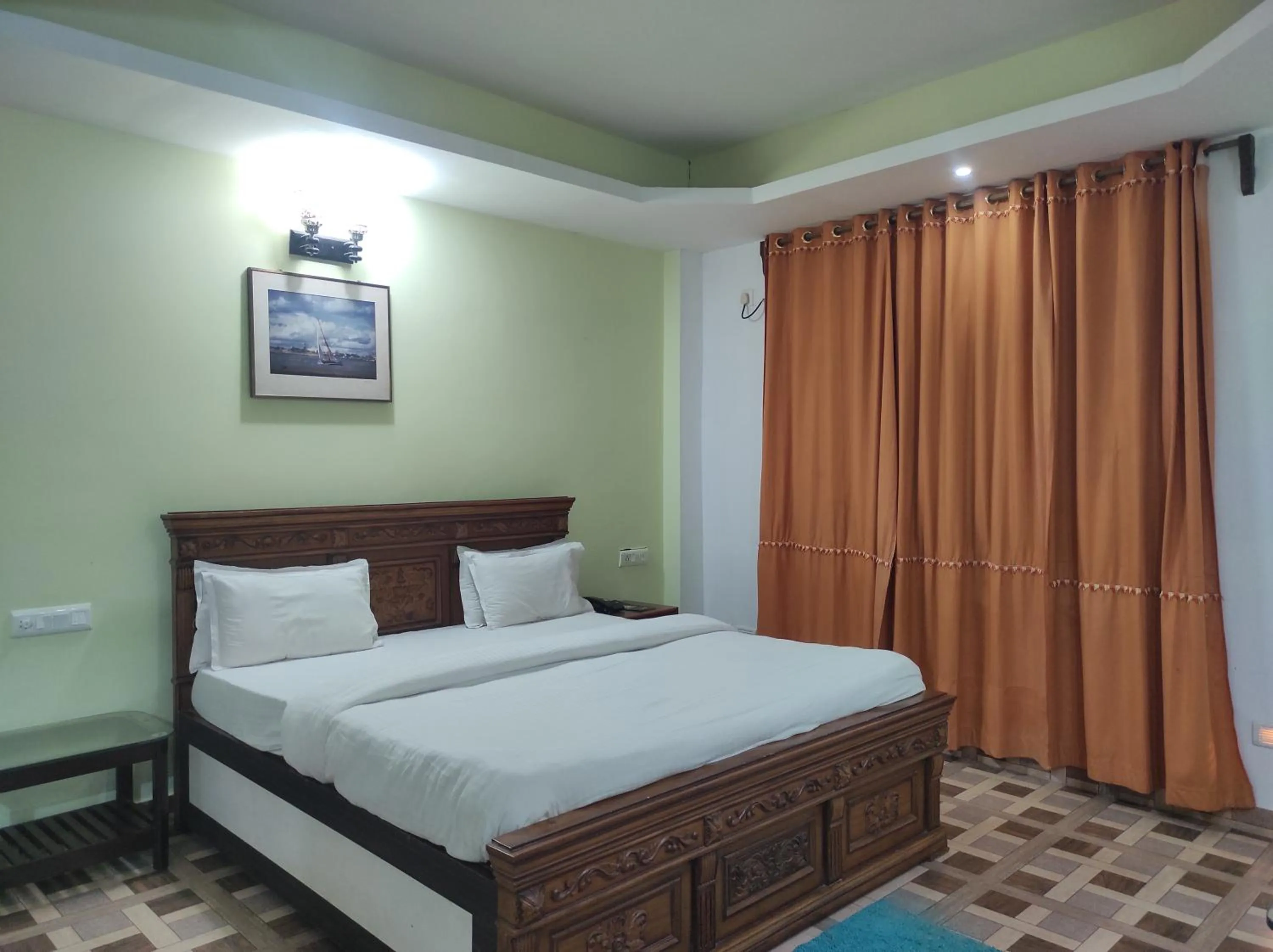 Bed in Hotel Sanjivani Heritage Top Best Budget Hotels in Dibrugarh, Assam
