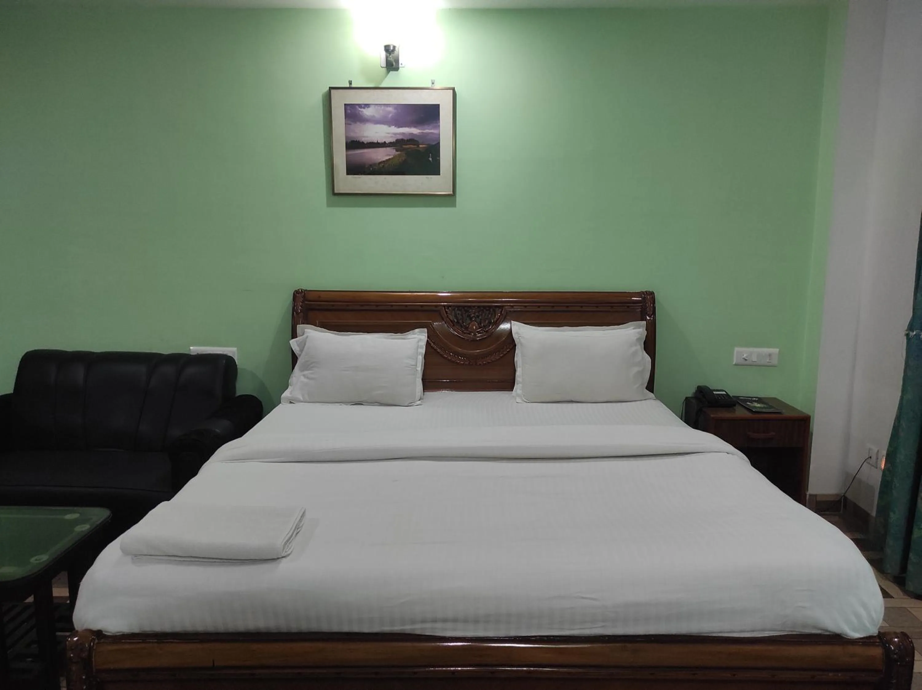 Bed in Hotel Sanjivani Heritage Top Best Budget Hotels in Dibrugarh, Assam
