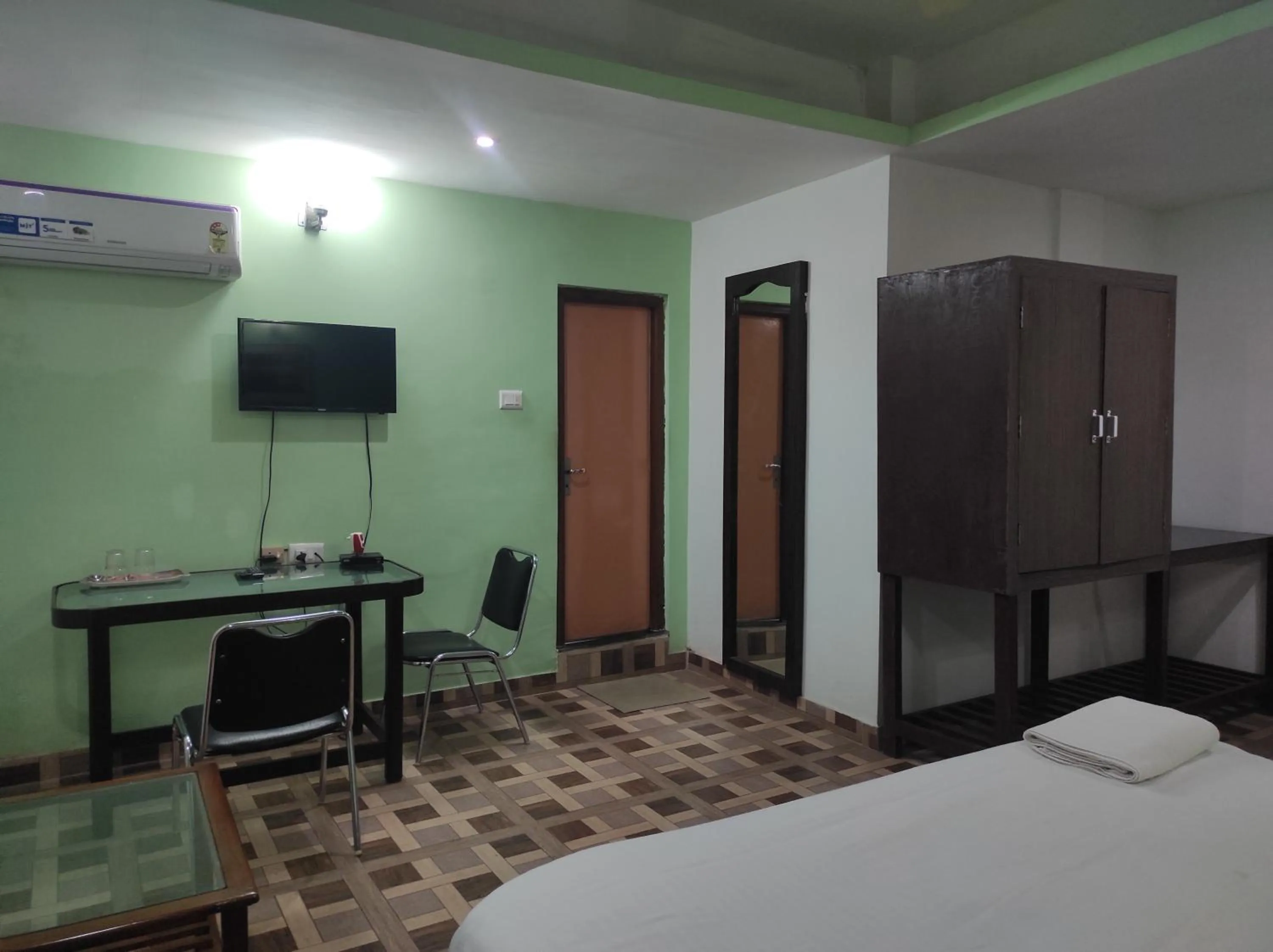 Bed in Hotel Sanjivani Heritage Top Best Budget Hotels in Dibrugarh, Assam