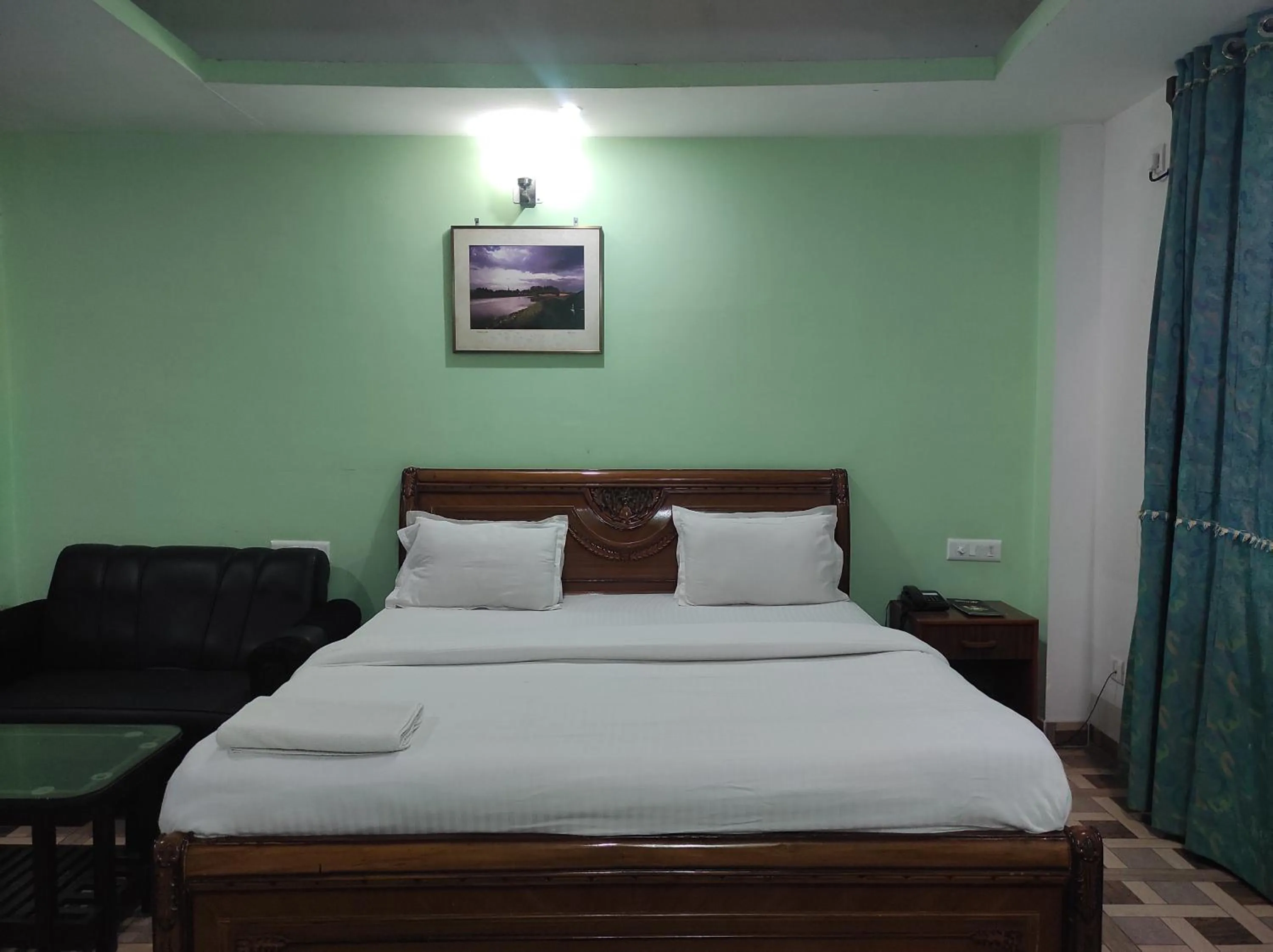 Bed in Hotel Sanjivani Heritage Top Best Budget Hotels in Dibrugarh, Assam
