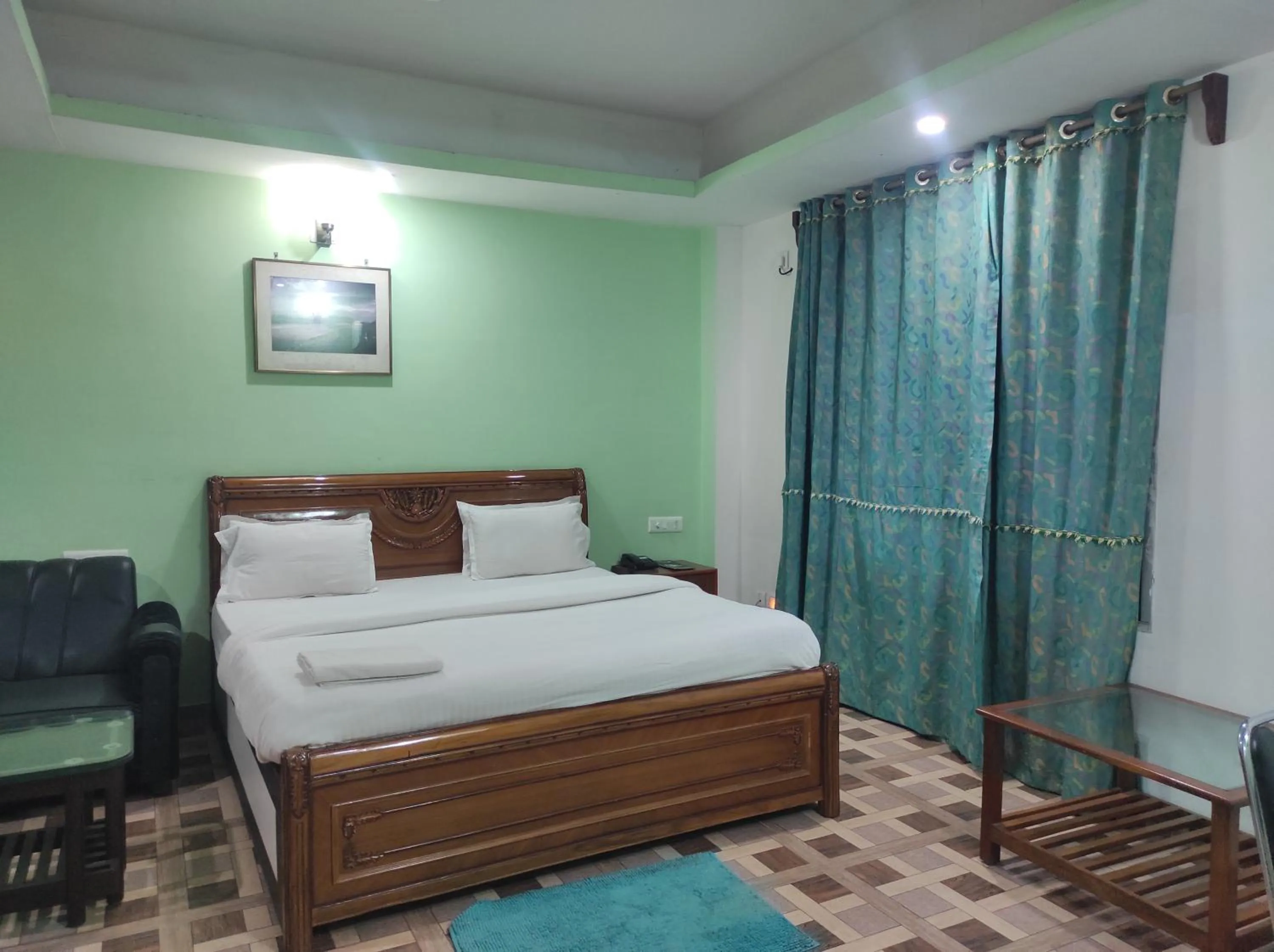 Bed in Hotel Sanjivani Heritage Top Best Budget Hotels in Dibrugarh, Assam