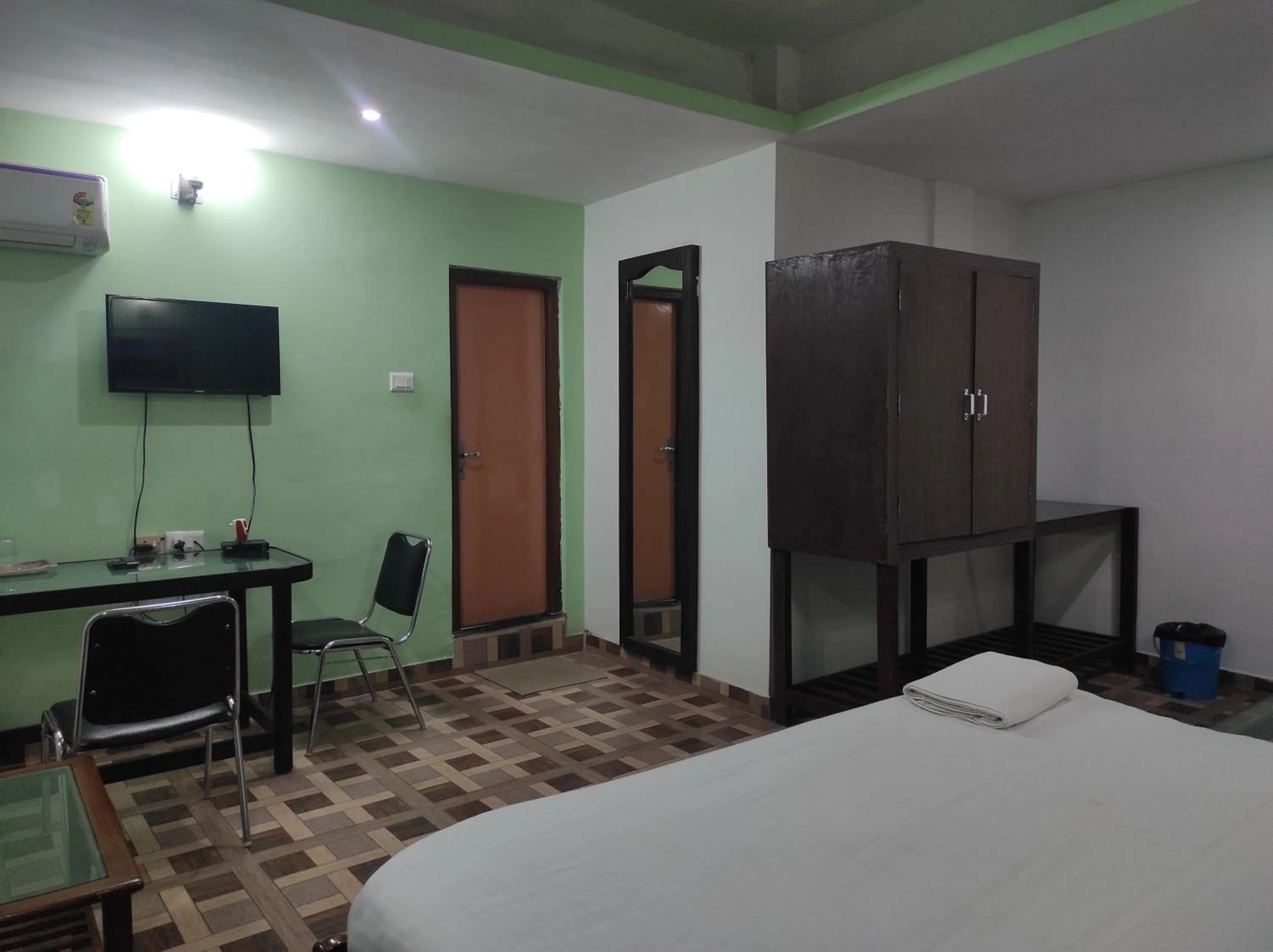 Bed in Hotel Sanjivani Heritage Top Best Budget Hotels in Dibrugarh, Assam