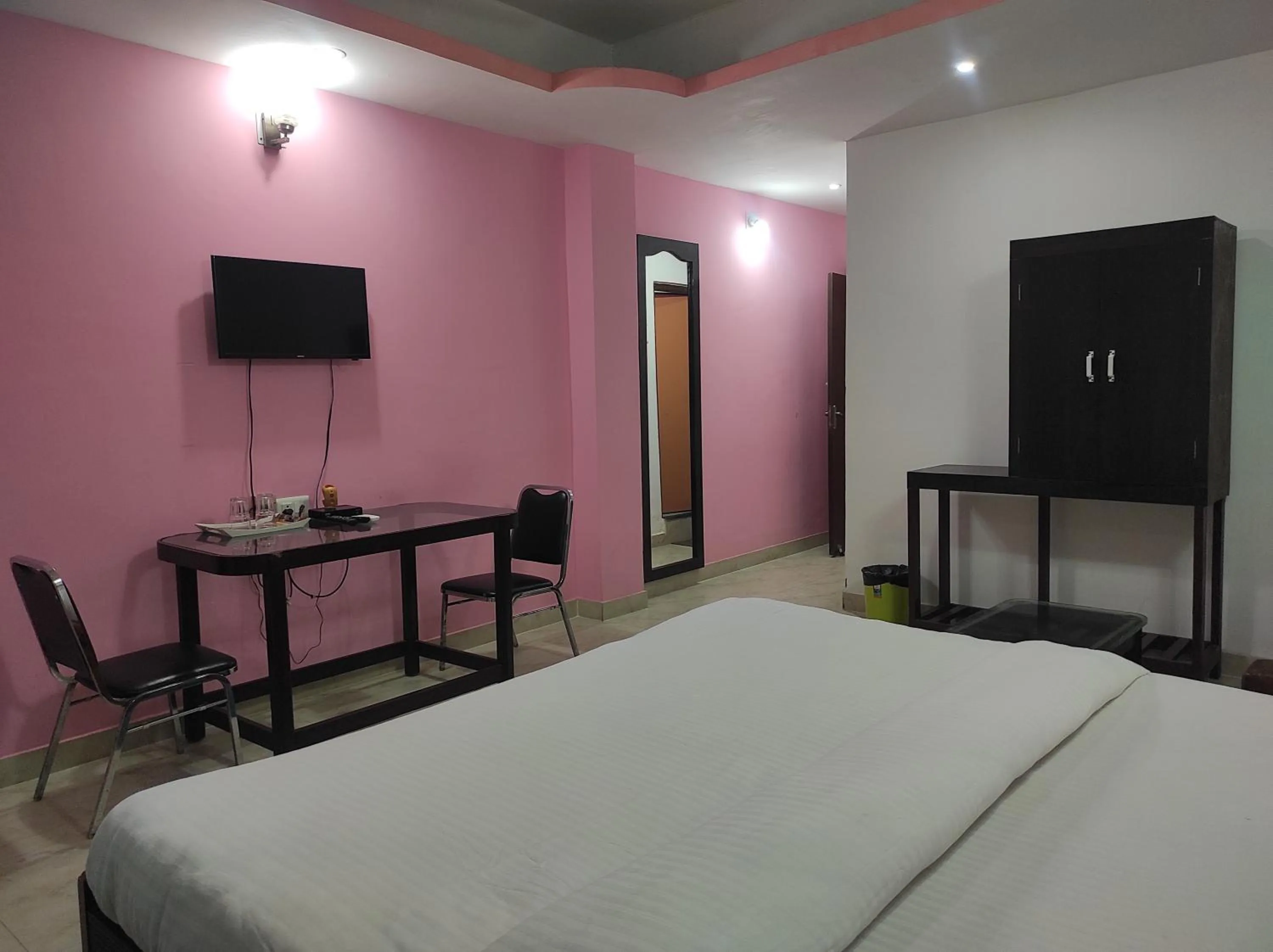 Bed in Hotel Sanjivani Heritage Top Best Budget Hotels in Dibrugarh, Assam