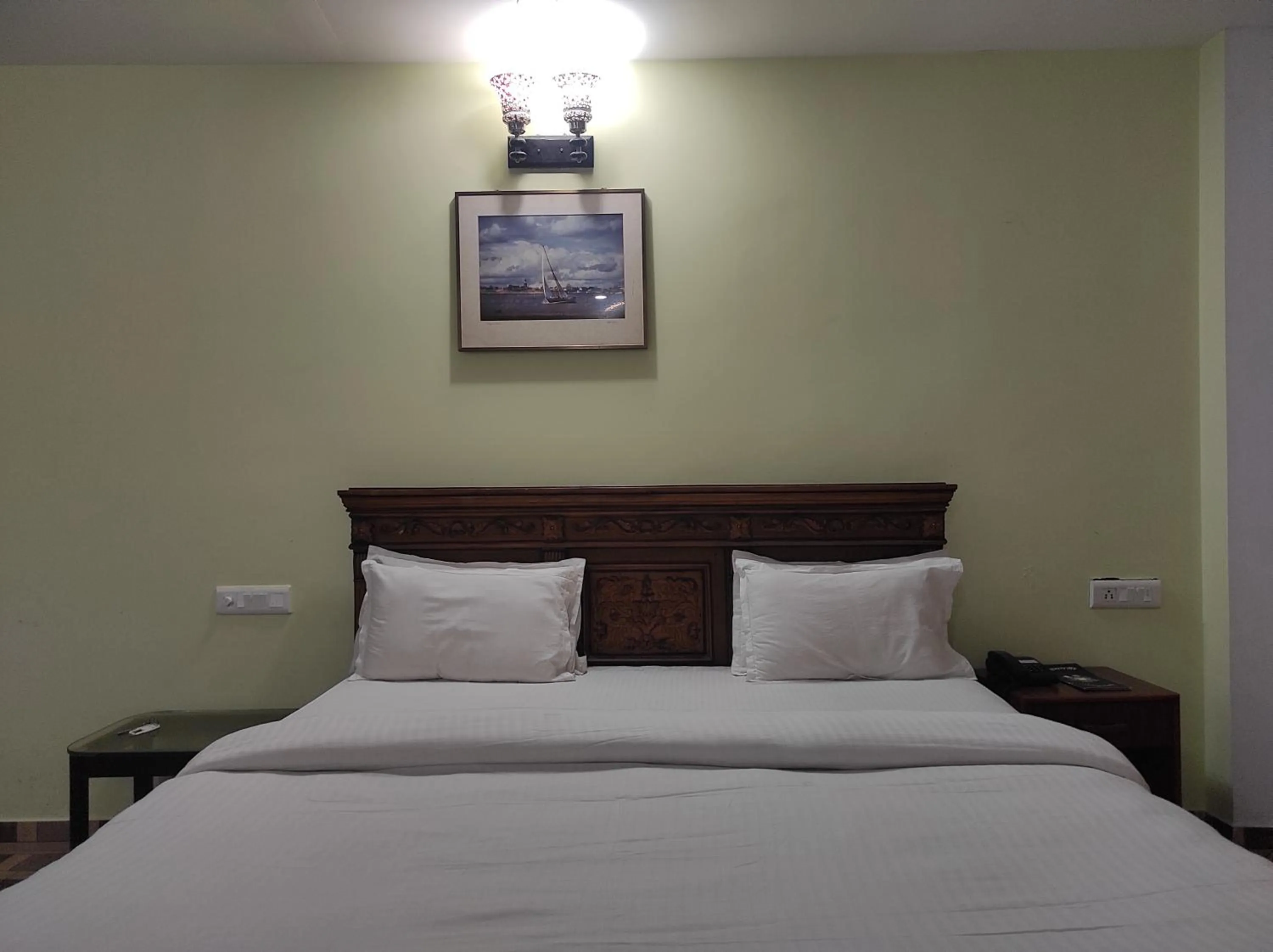 Bed in Hotel Sanjivani Heritage Top Best Budget Hotels in Dibrugarh, Assam