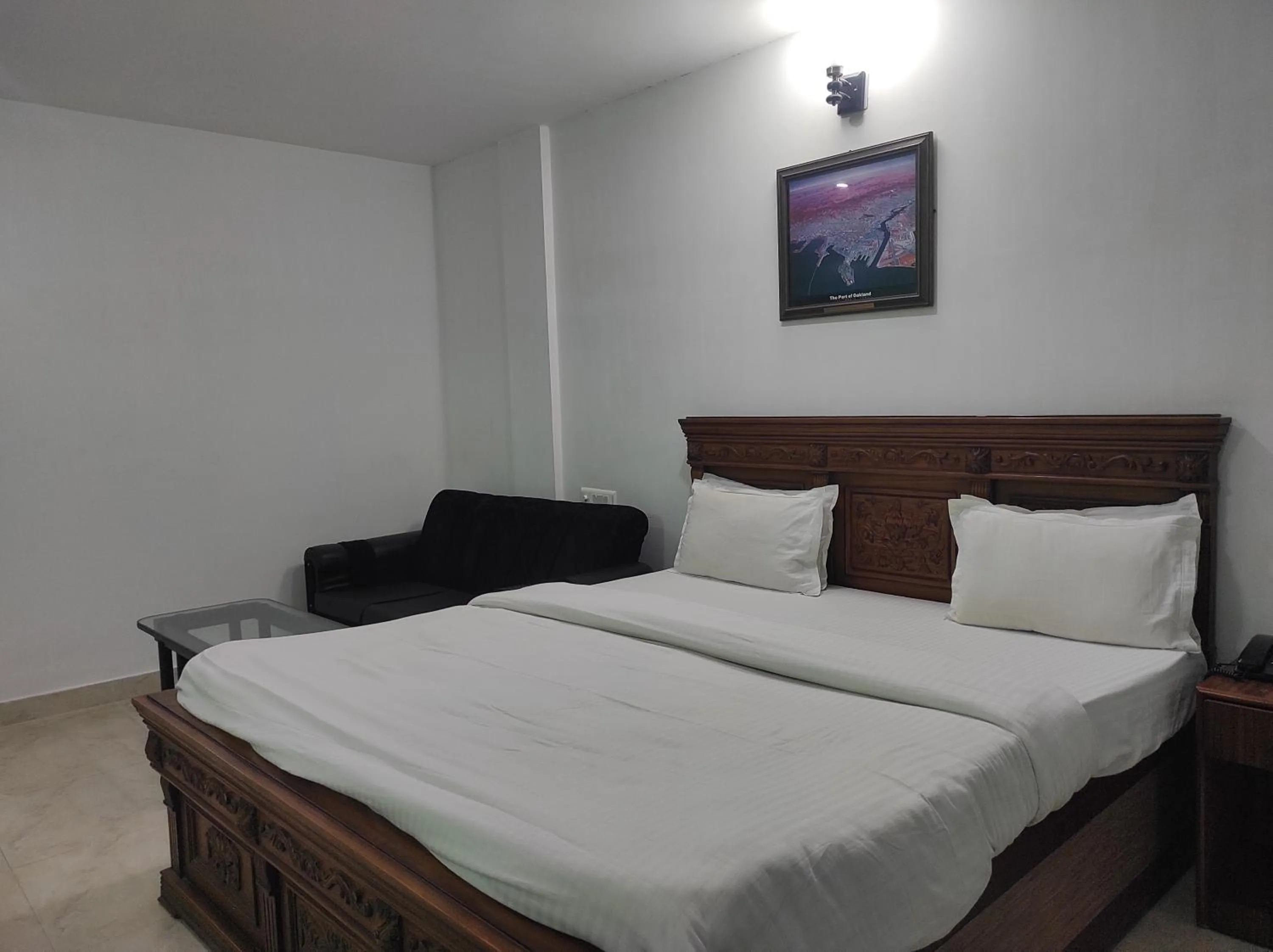 Bed in Hotel Sanjivani Heritage Top Best Budget Hotels in Dibrugarh, Assam