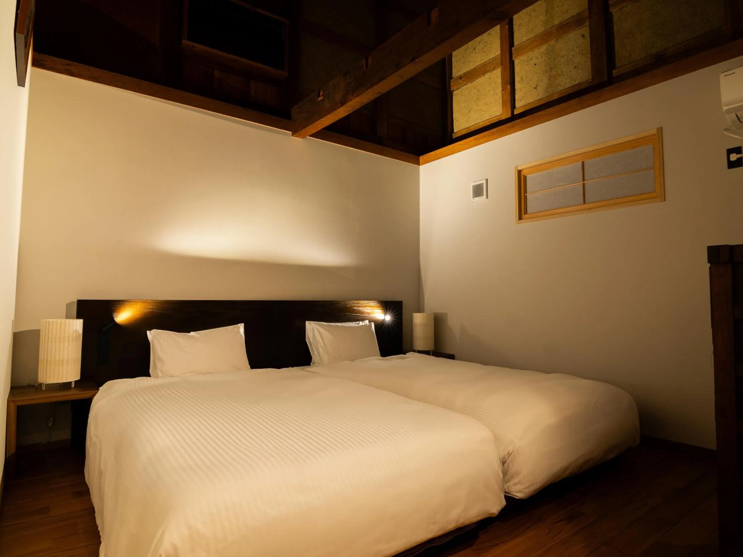 Bed in Auberge Homachi Mikuniminato