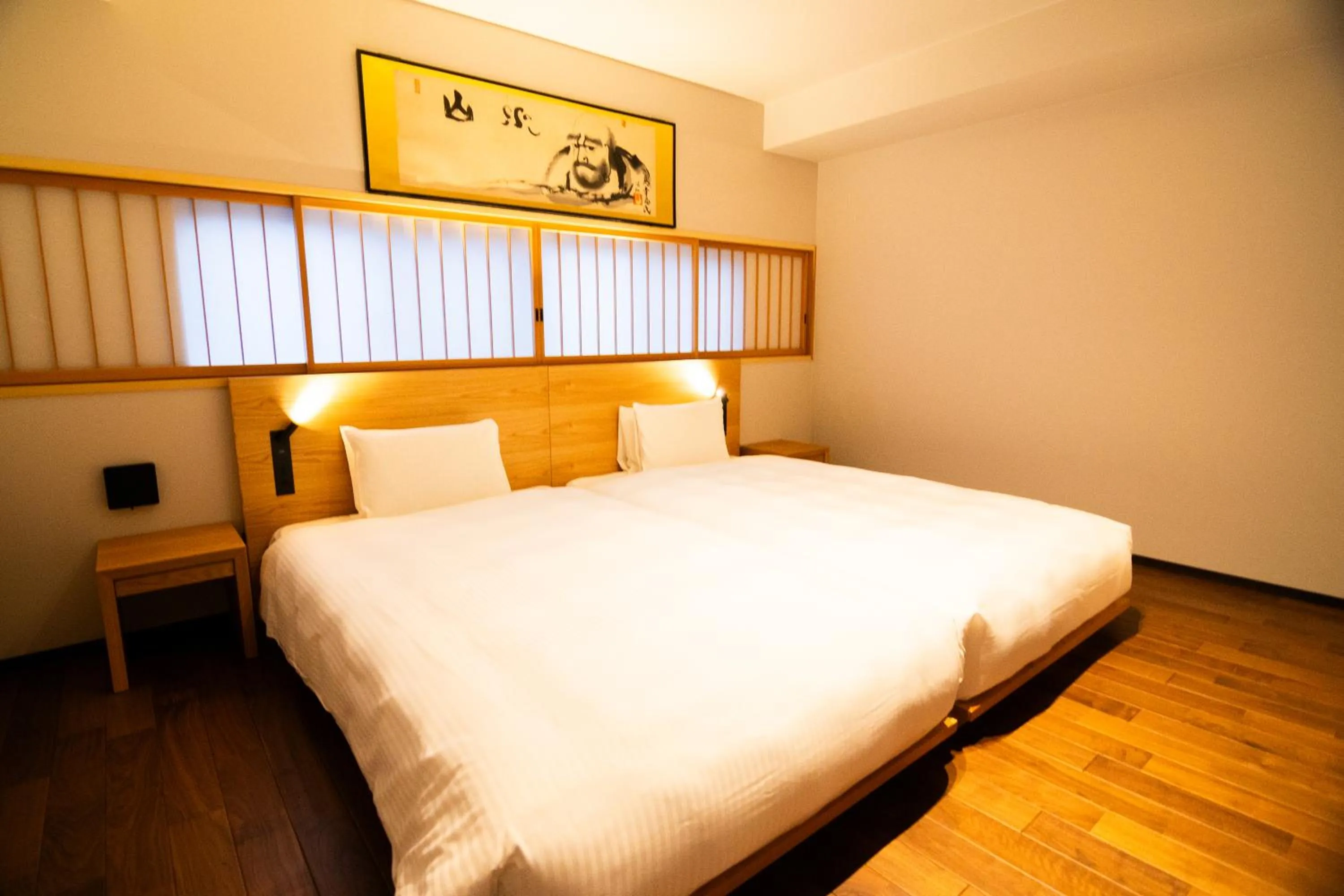 Bed in Auberge Homachi Mikuniminato