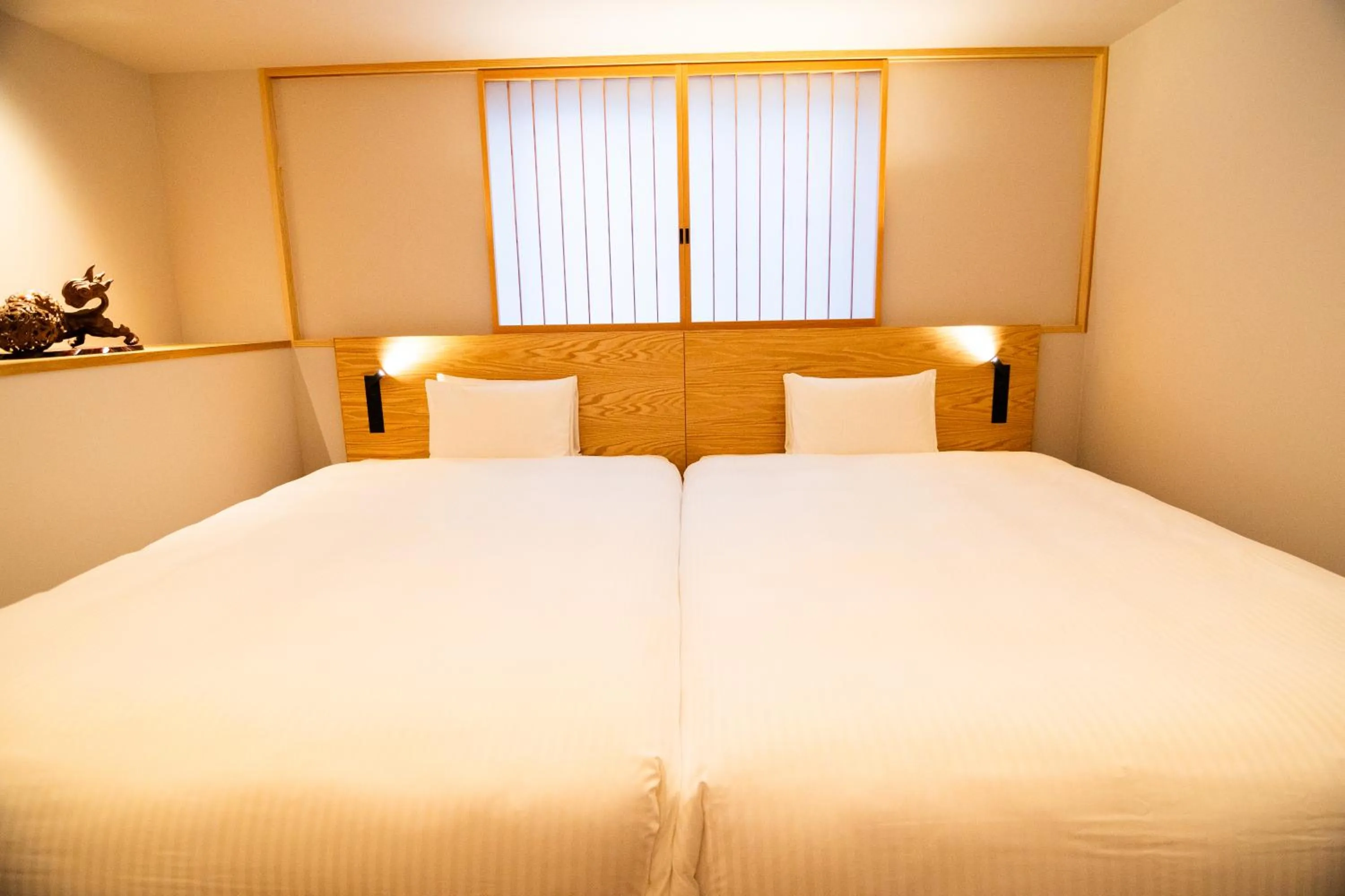 Bed in Auberge Homachi Mikuniminato