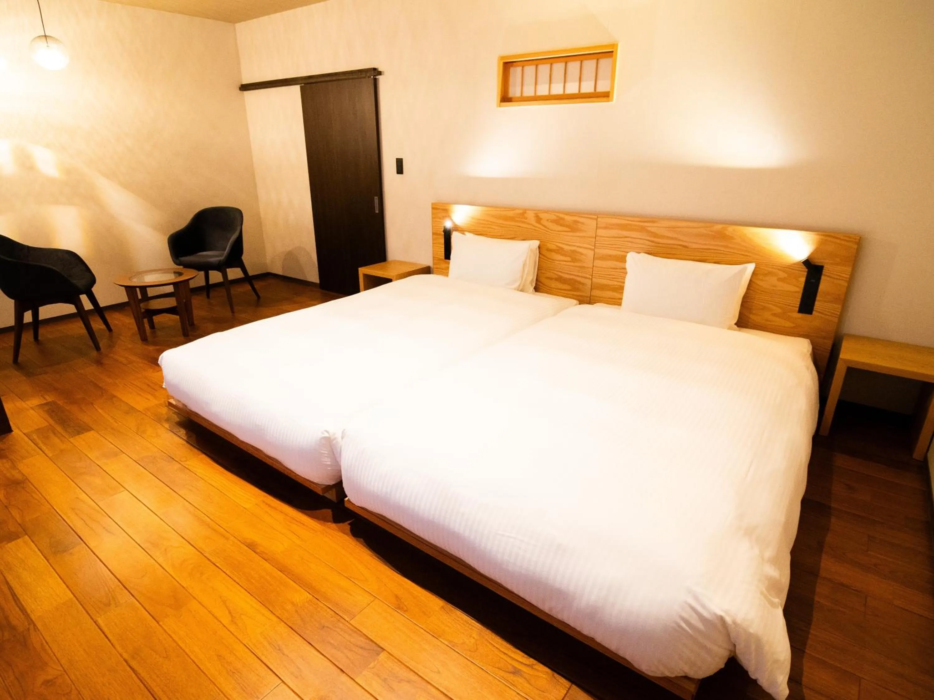 Bed in Auberge Homachi Mikuniminato