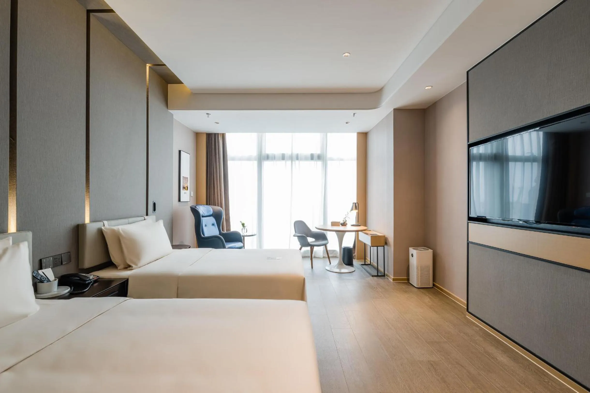 Bed in Atour Hotel Wuxi Coast City