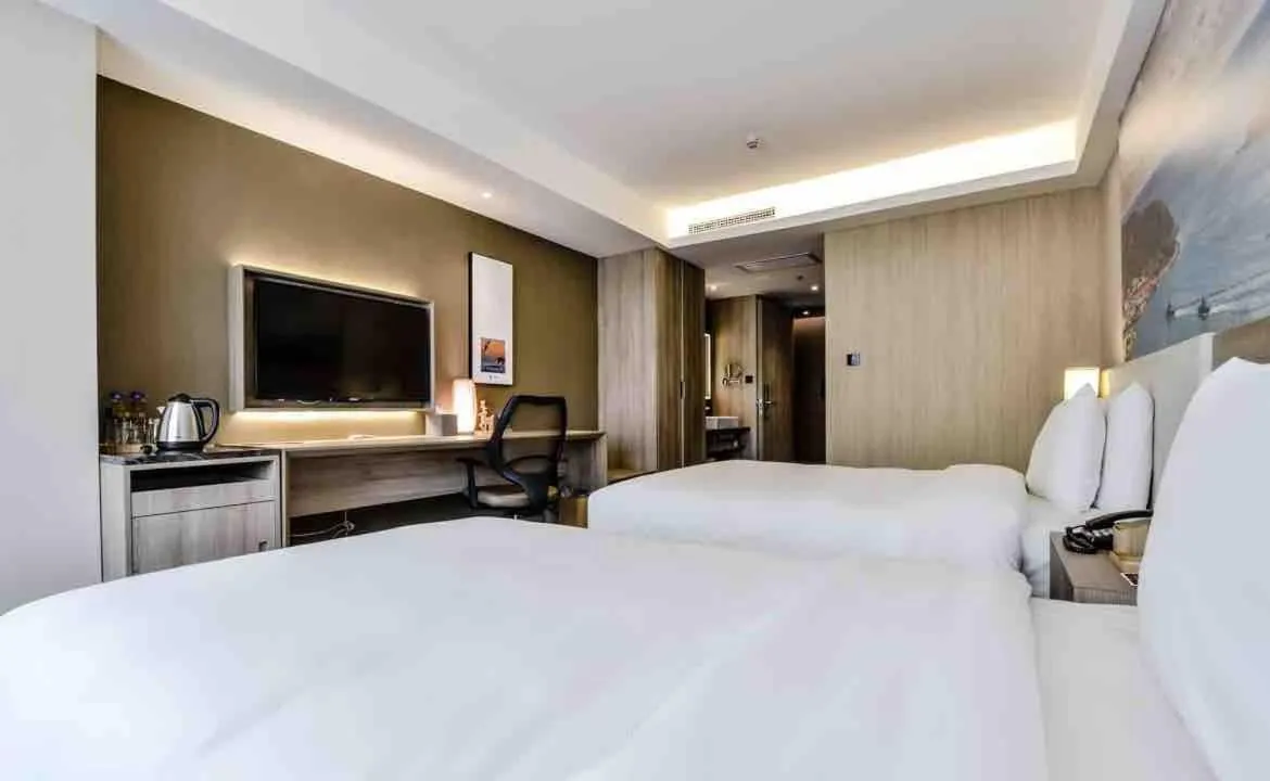 Bed in Atour Hotel Dalian Zhongshan Square