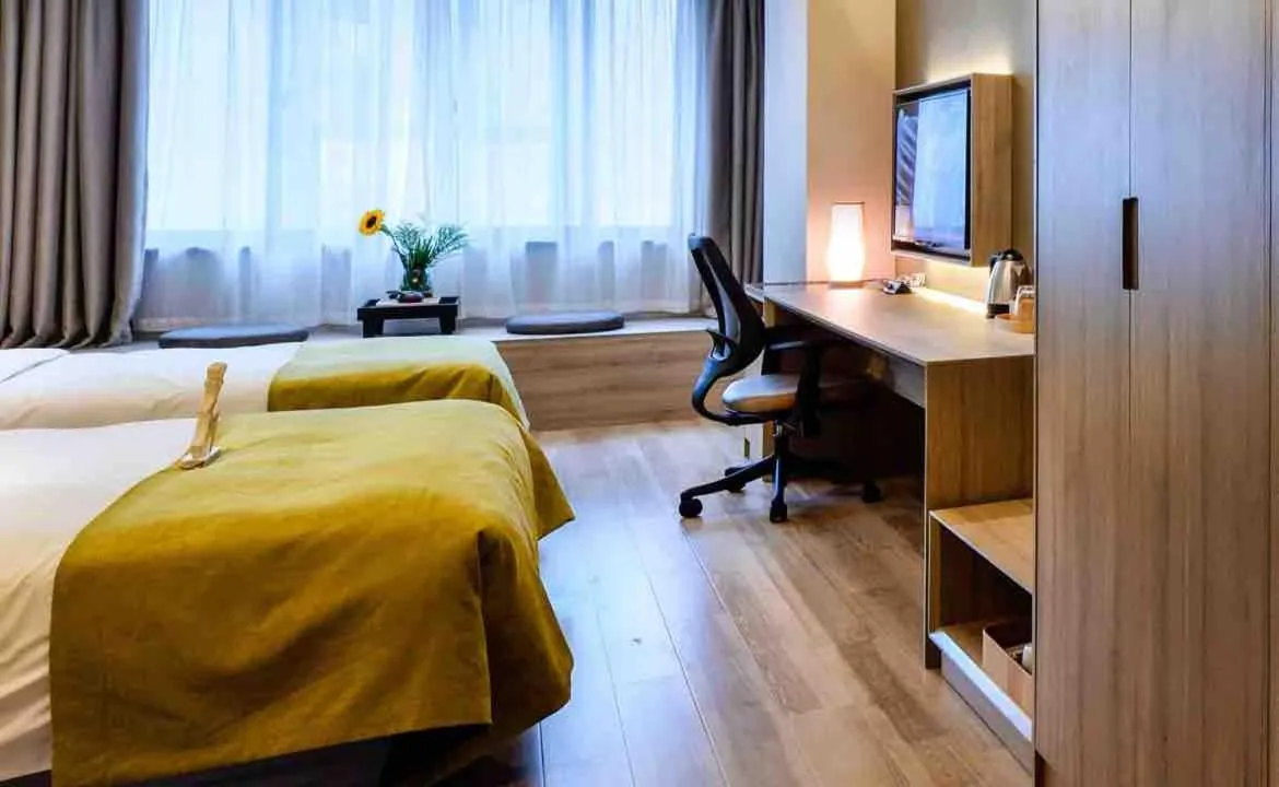 Bed in Atour Hotel Dalian Zhongshan Square