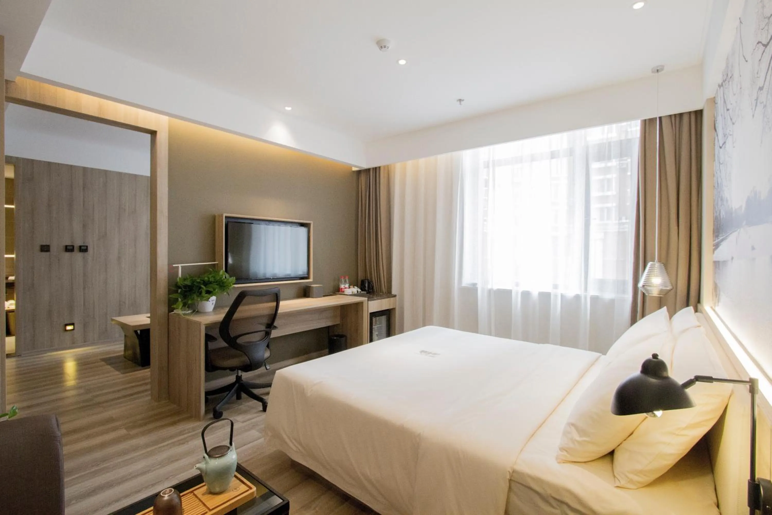 Bed in Atour Hotel Dalian Zhongshan Square