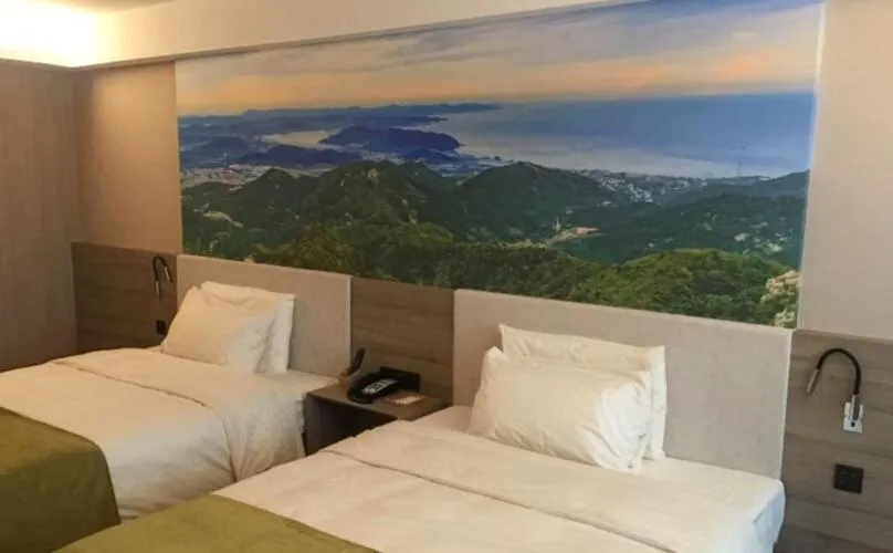 Bed in Atour Hotel Dalian Zhongshan Square