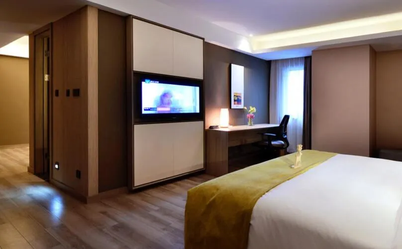 Bed in Atour Hotel Dalian Zhongshan Square