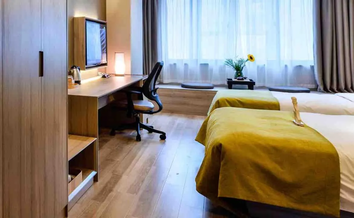 Bed in Atour Hotel Dalian Zhongshan Square