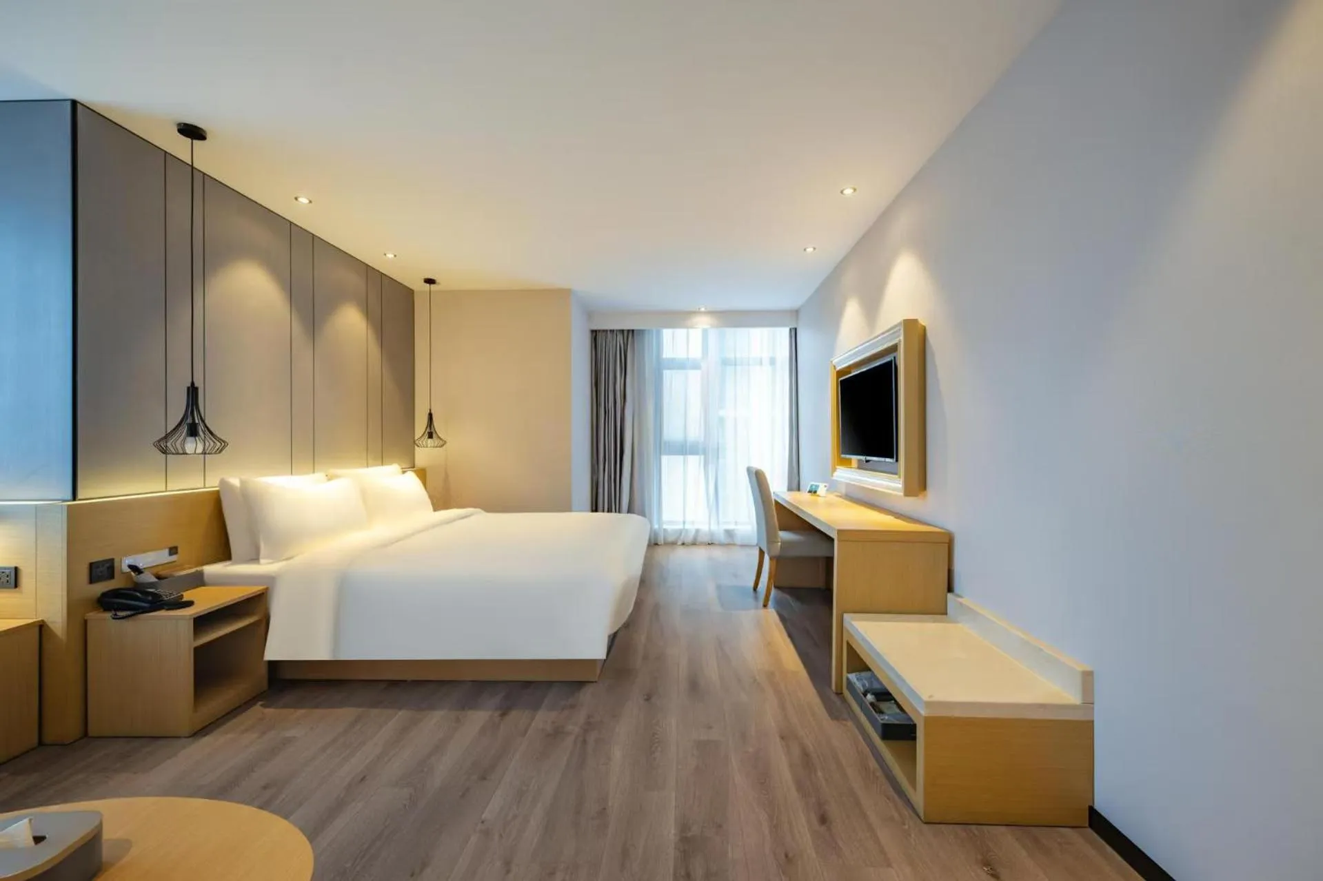 Bed in Atour X Hotel Hangzhou Binjiang Jiangnan Avenue