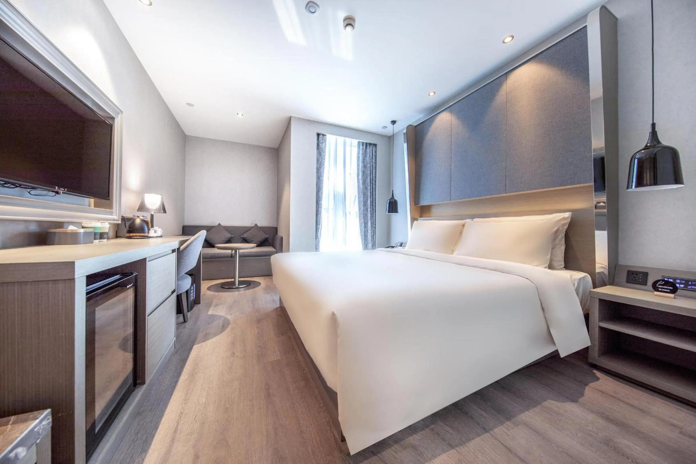 Bed in Atour X Hotel Hangzhou Binjiang Jiangnan Avenue