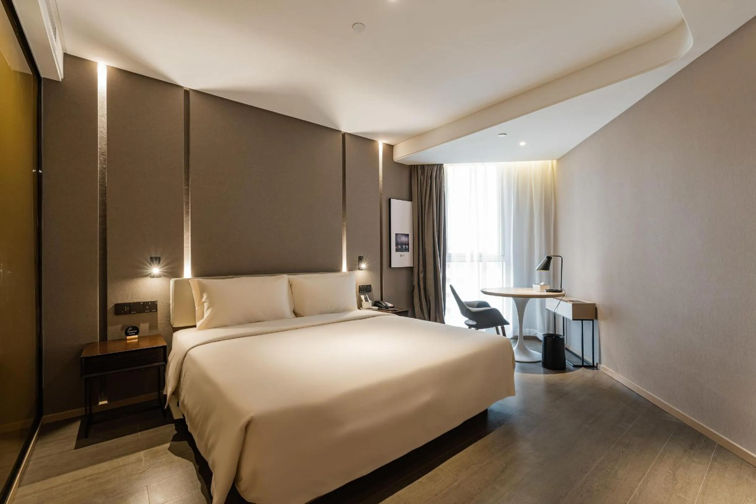 Bed in Atour Hotel Ningbo Yinzhou Impression City