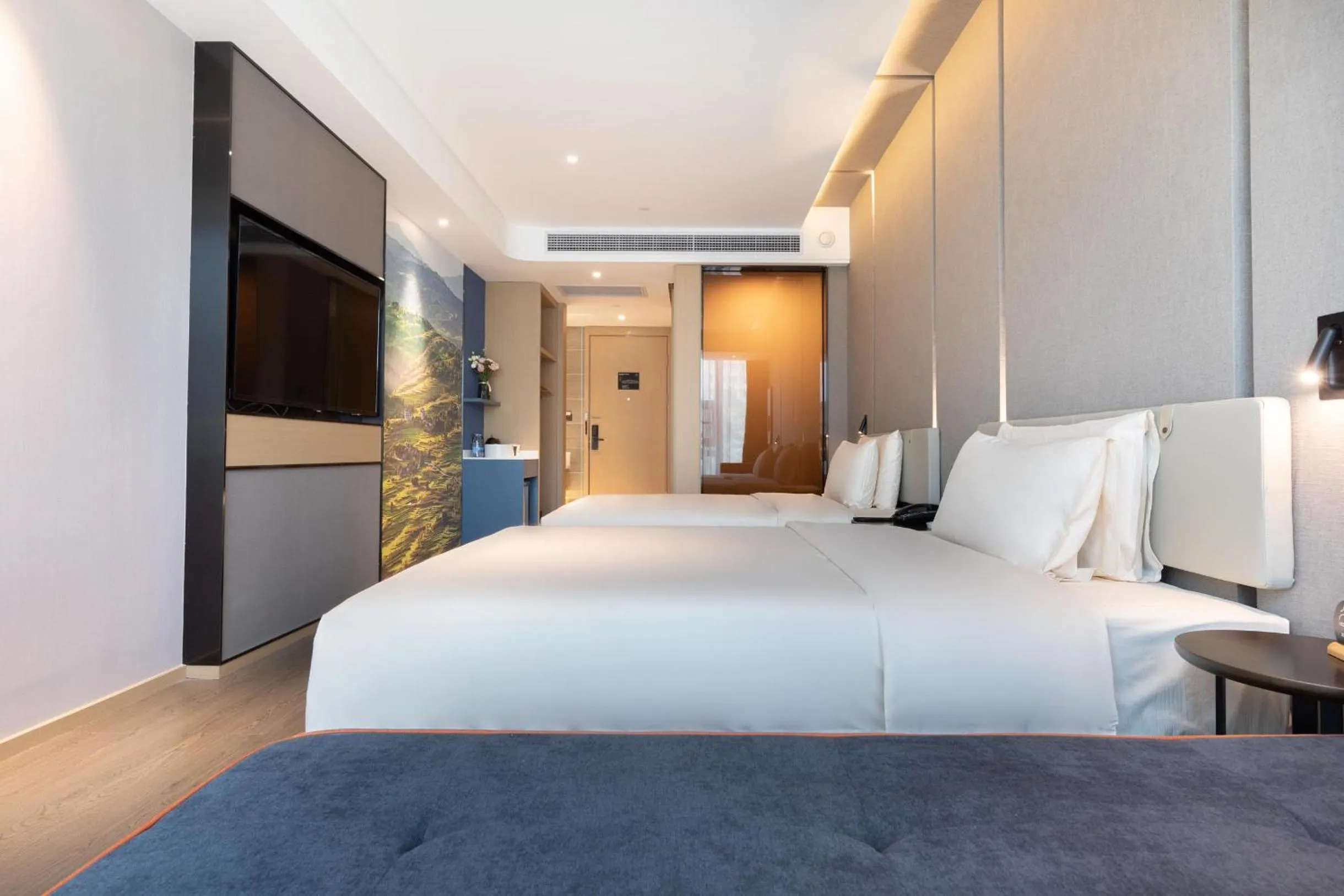 Bed in Atour Hotel Chongqing Guanyinqiao Flower Garden