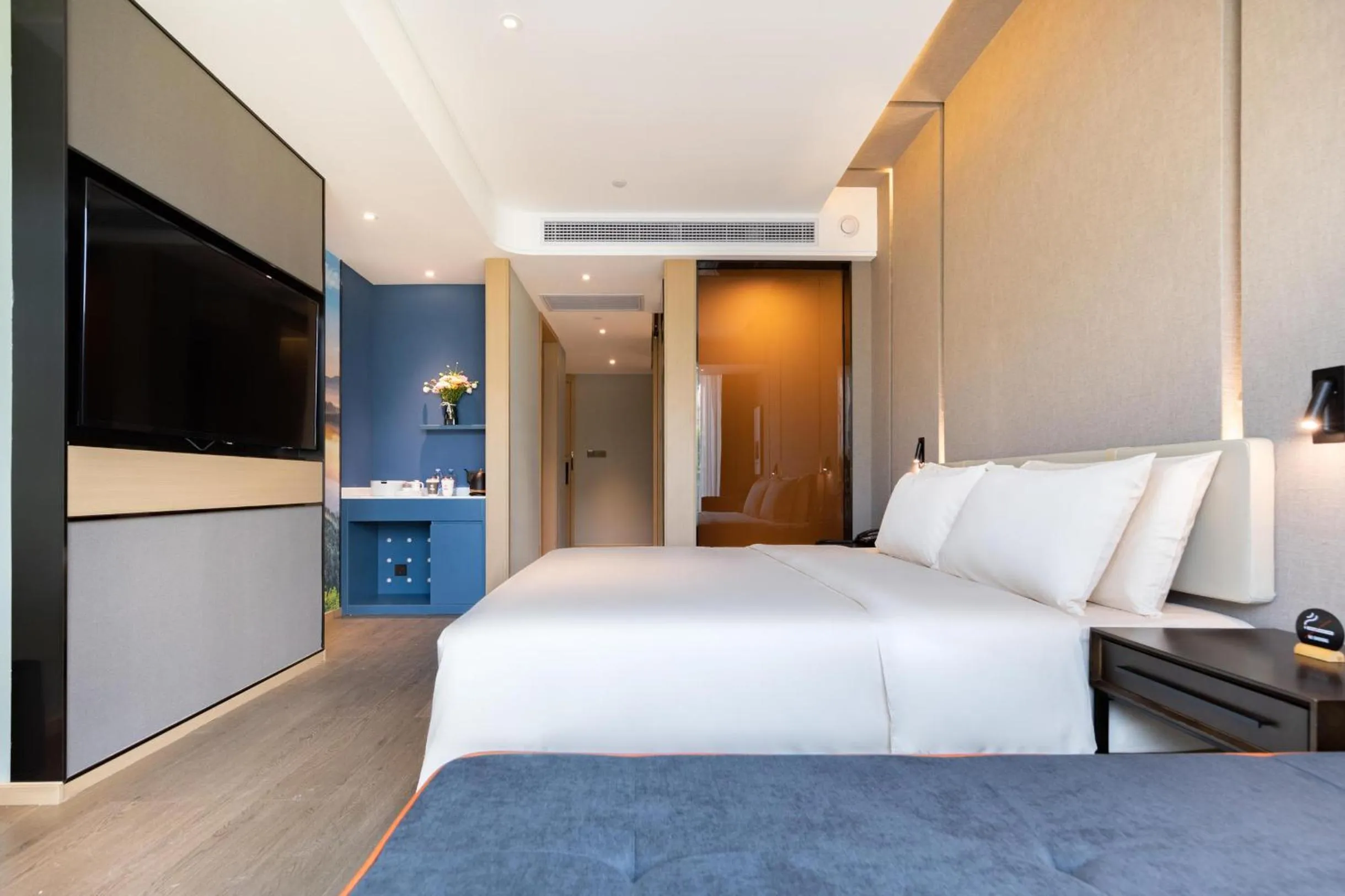 Bed in Atour Hotel Chongqing Guanyinqiao Flower Garden