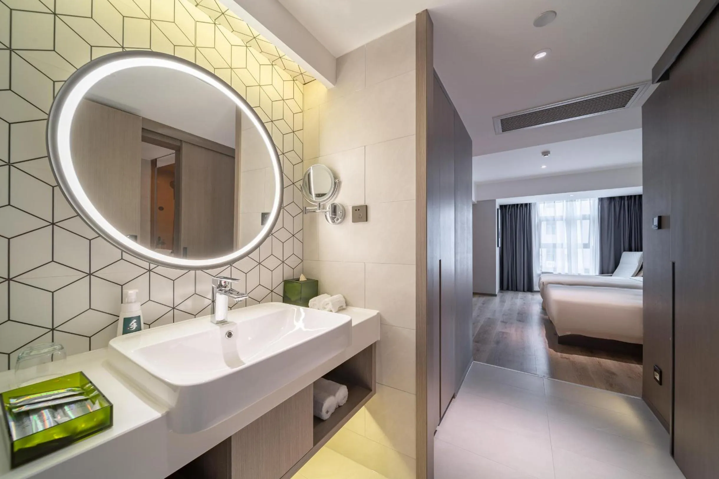 Bed in Atour Light Hotel Guiyang Fountain