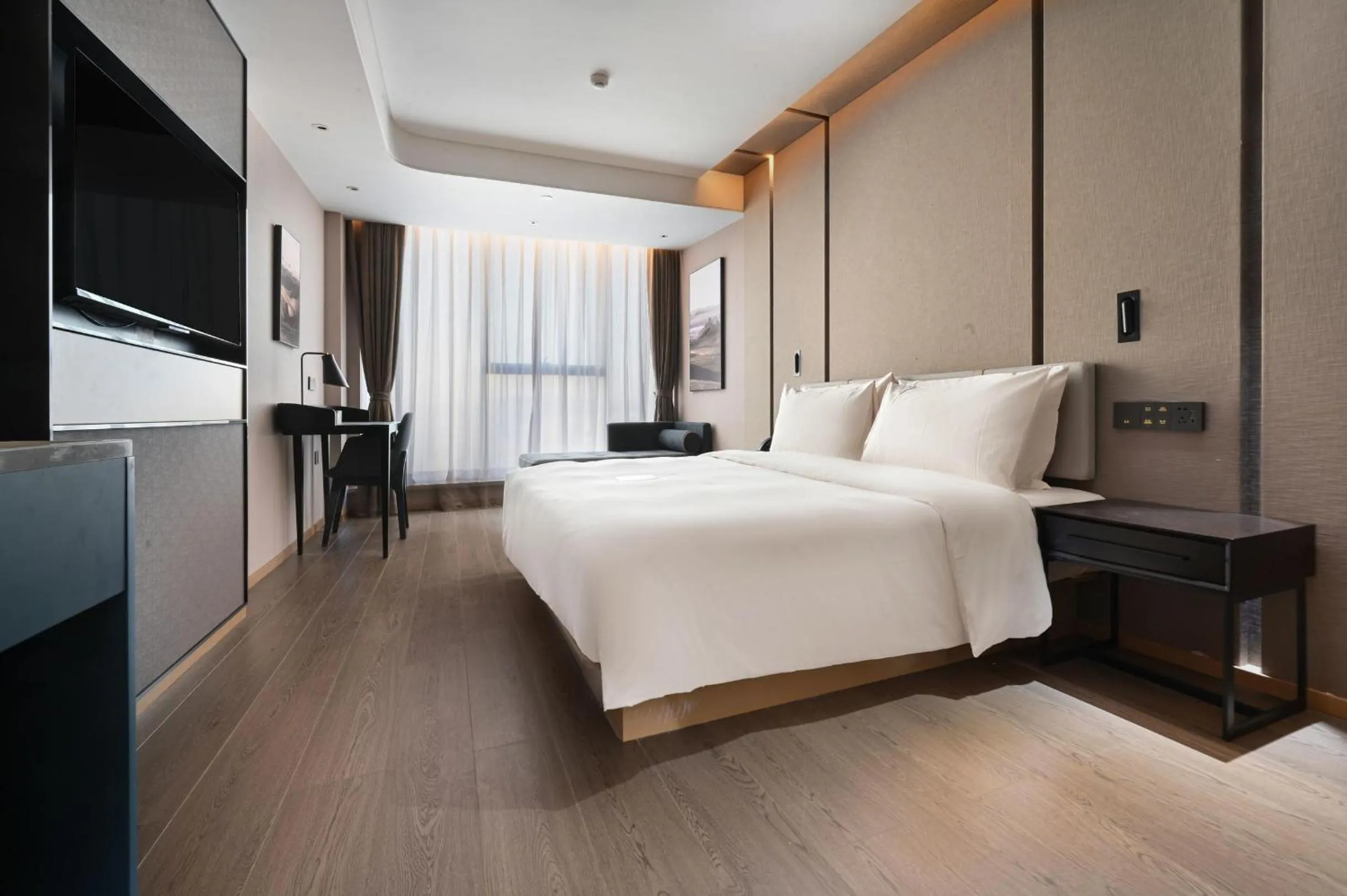 Bed in Atour Hotel Kunming Changshui International Airport