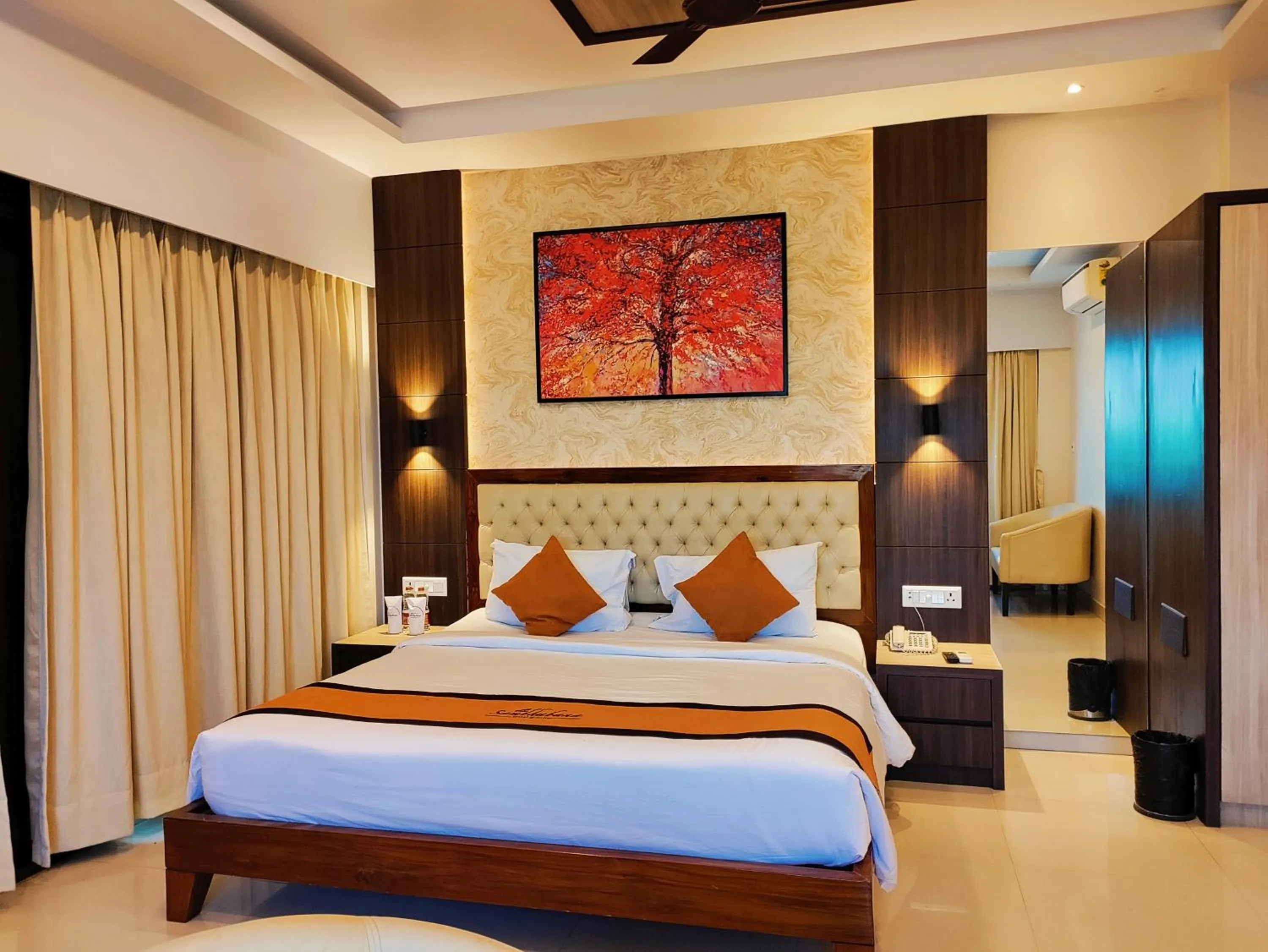 Bed in Sambhabana Hotel & Suites