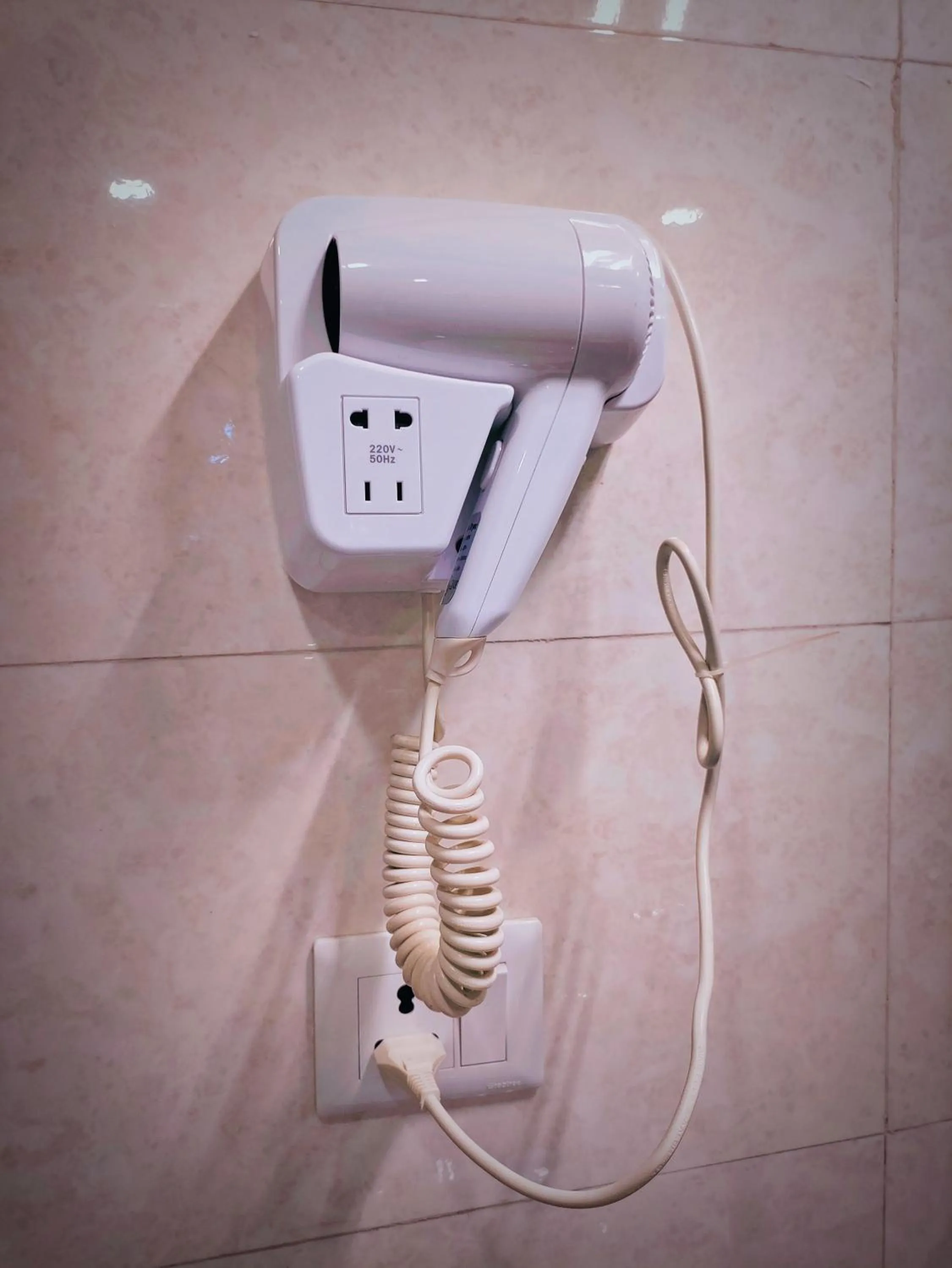 dryer in Sambhabana Hotel & Suites