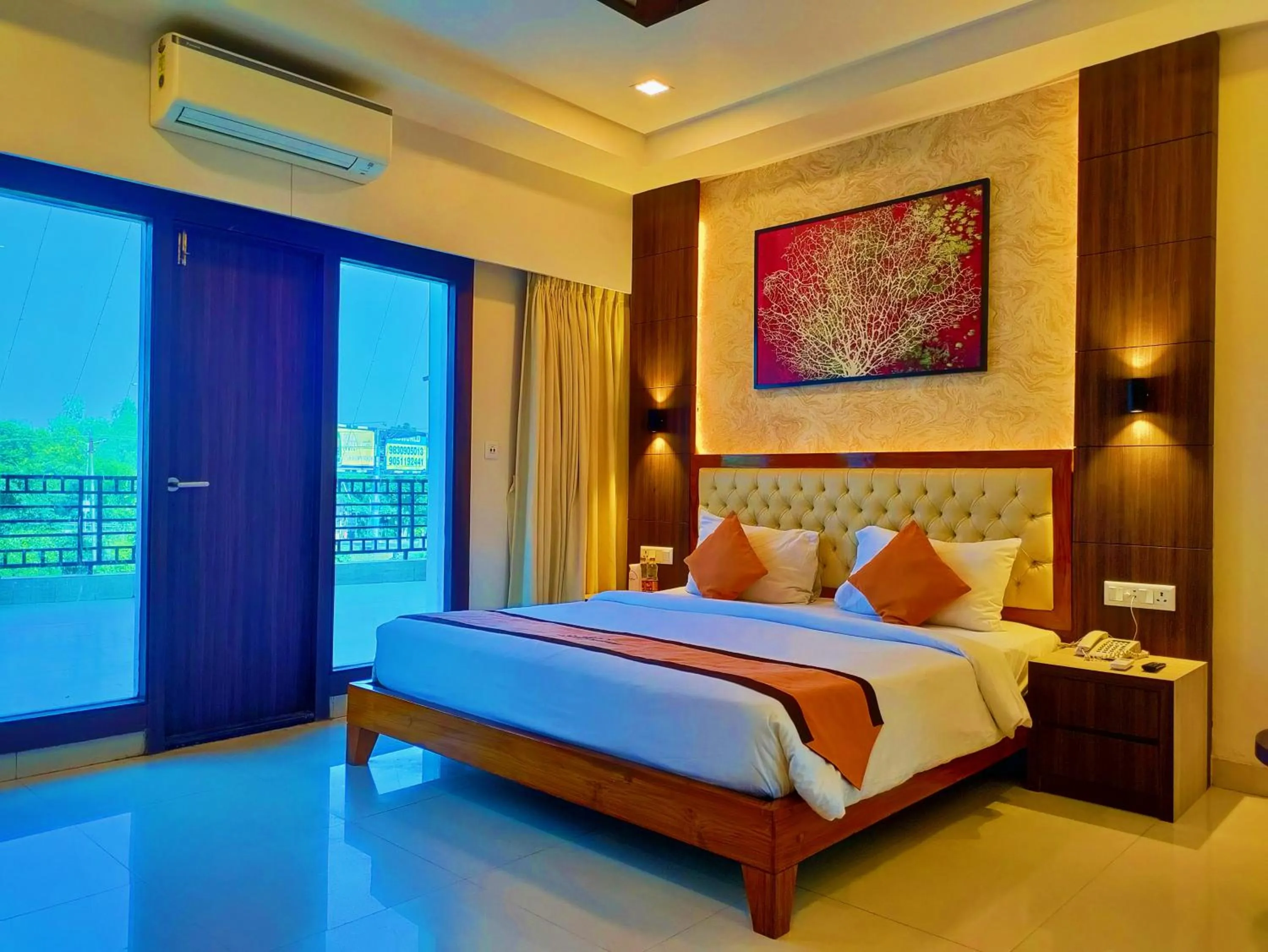 Bed in Sambhabana Hotel & Suites