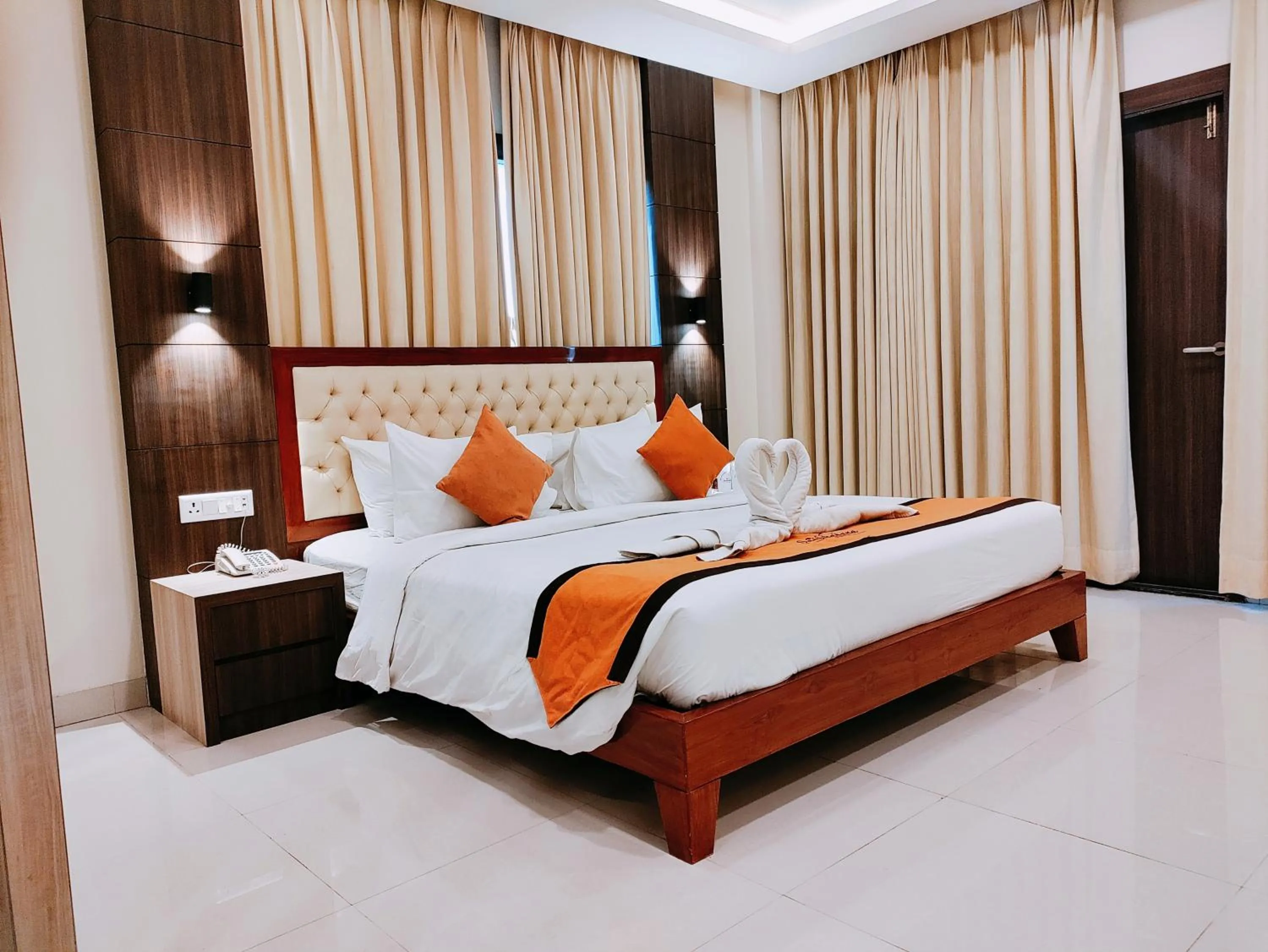 Bed in Sambhabana Hotel & Suites