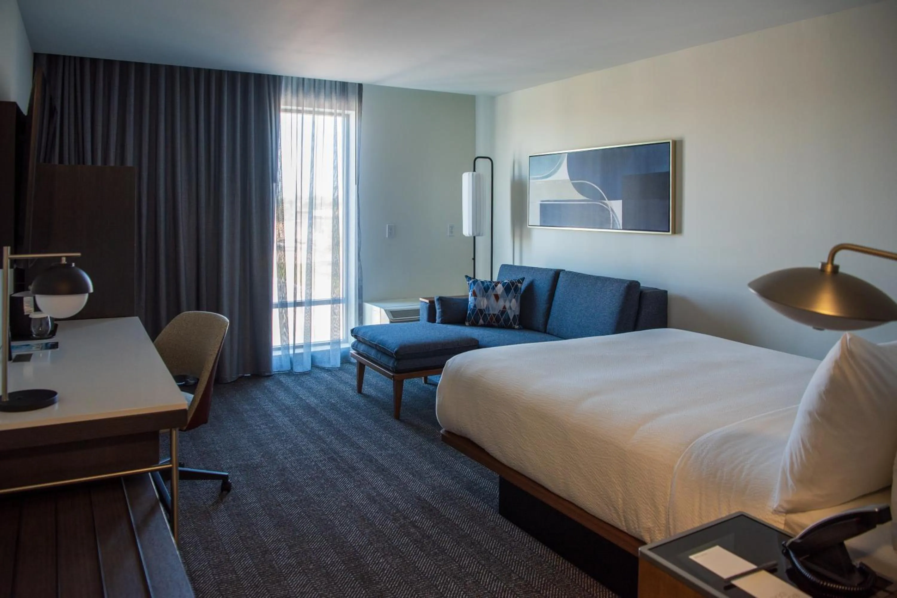 Seating area, Bed in Courtyard by Marriott Lake City