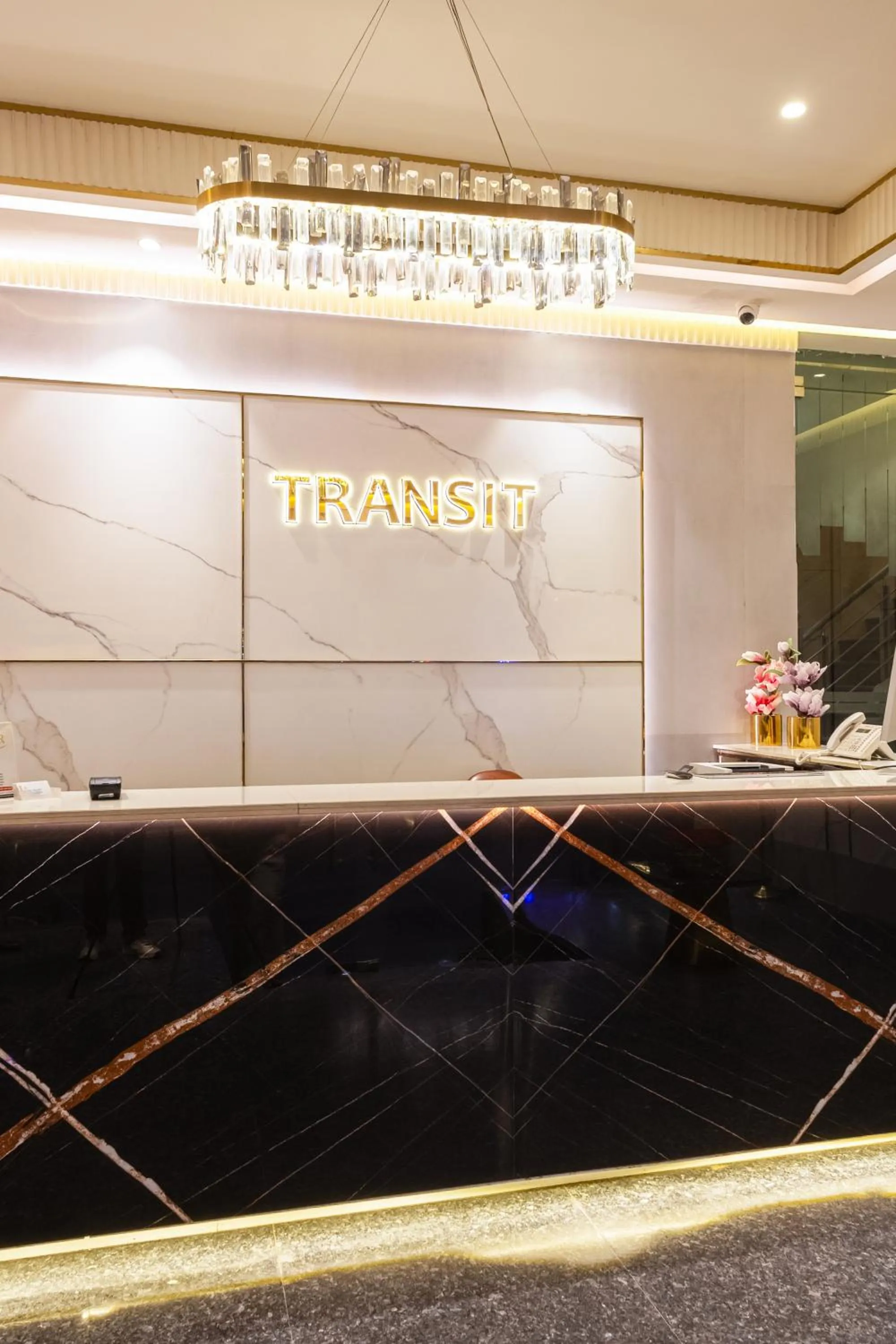 Property logo or sign in Hotel Transit International- Aerocity Delhi Airport