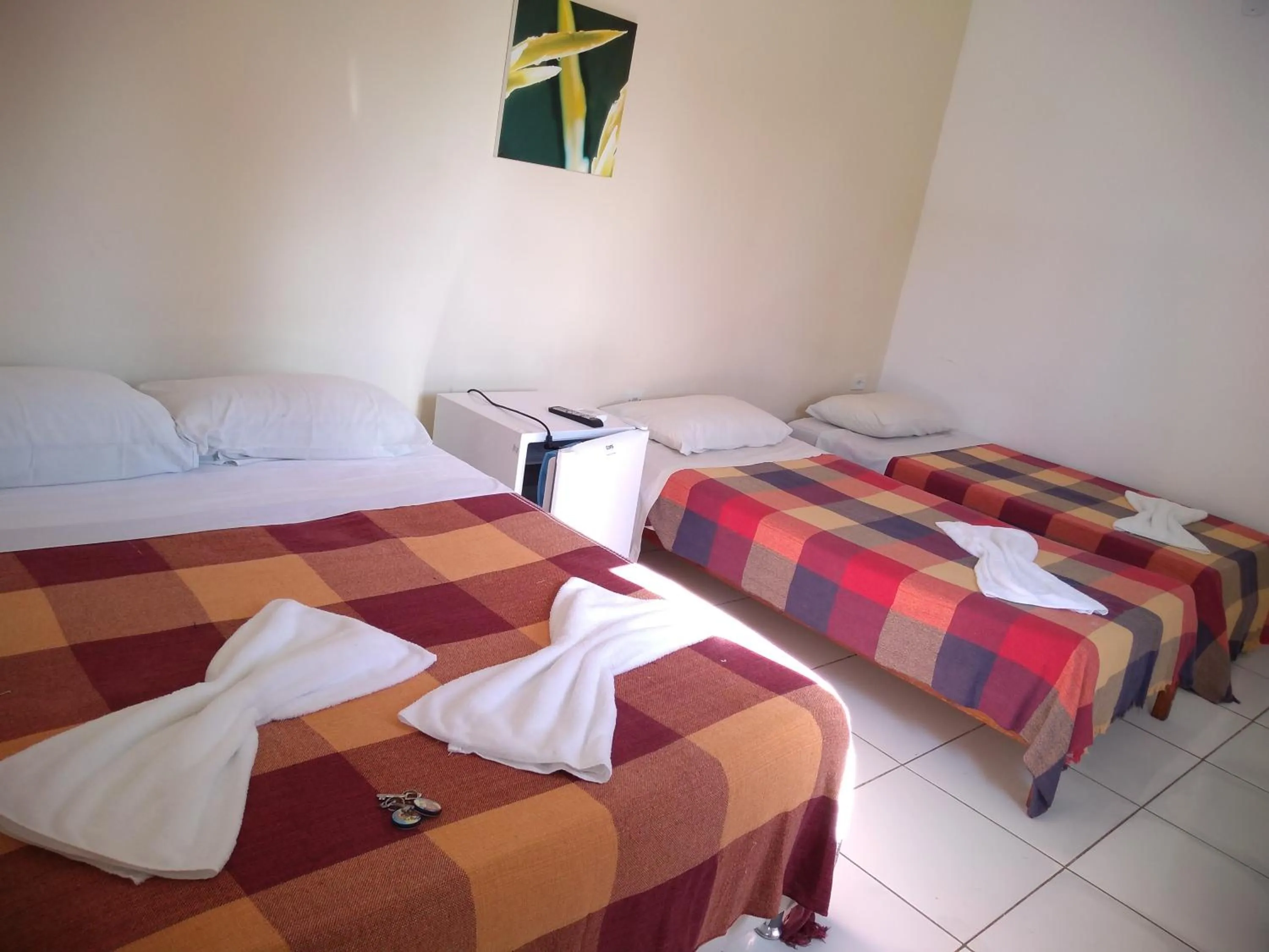 Photo of the whole room, Bed in Suítes São Francisco