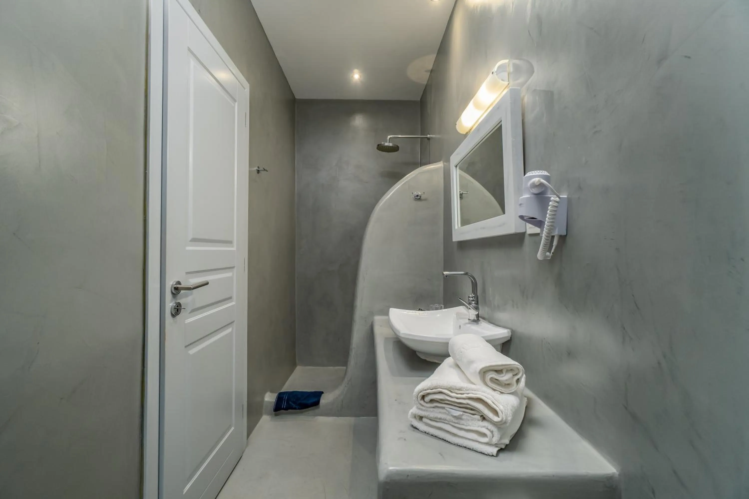 Bathroom in Central Fira Suites