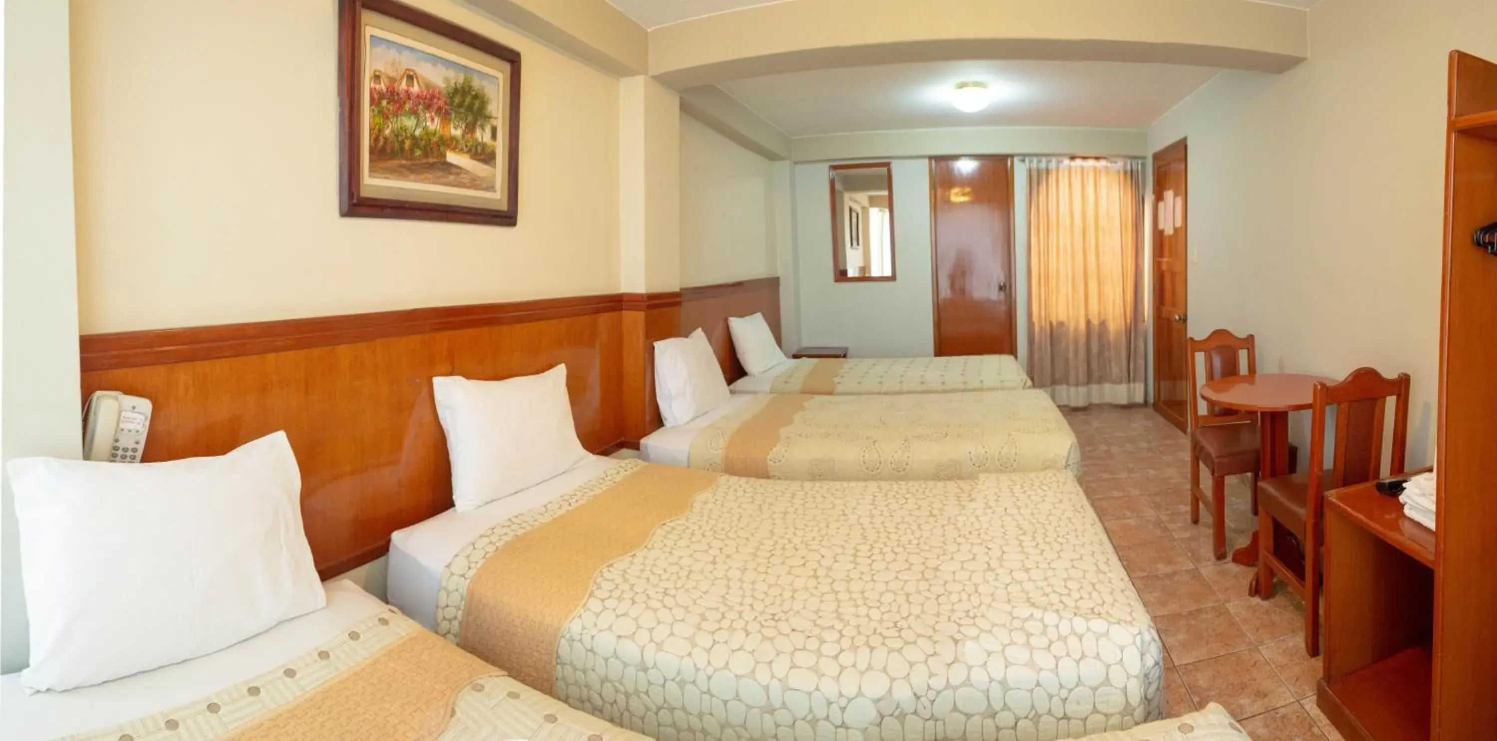 Standard Quadruple Room in Takana Inn Standard Quadruple Room in Takana Inn