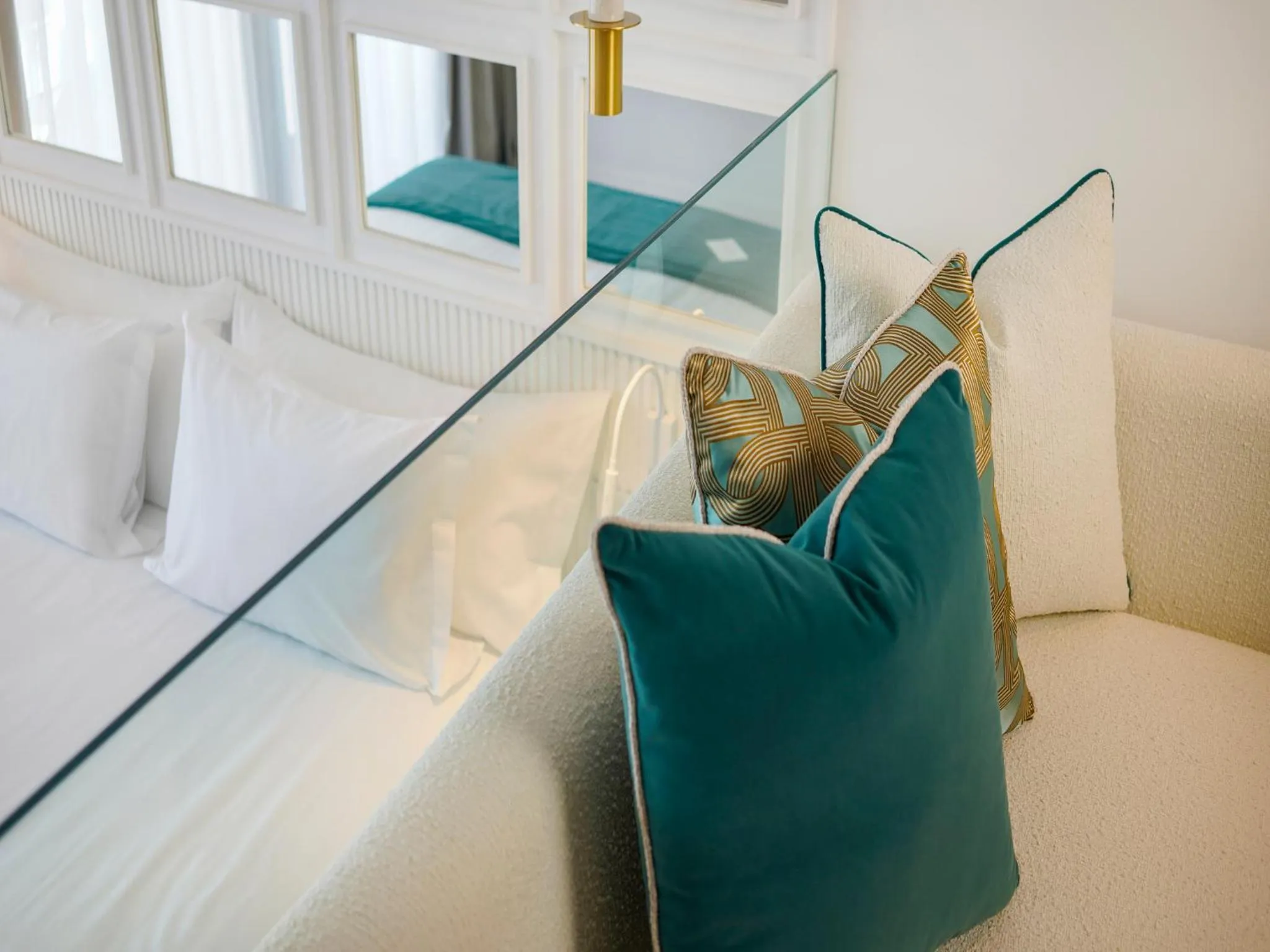 Bed in Petit Palace Suites Hotel