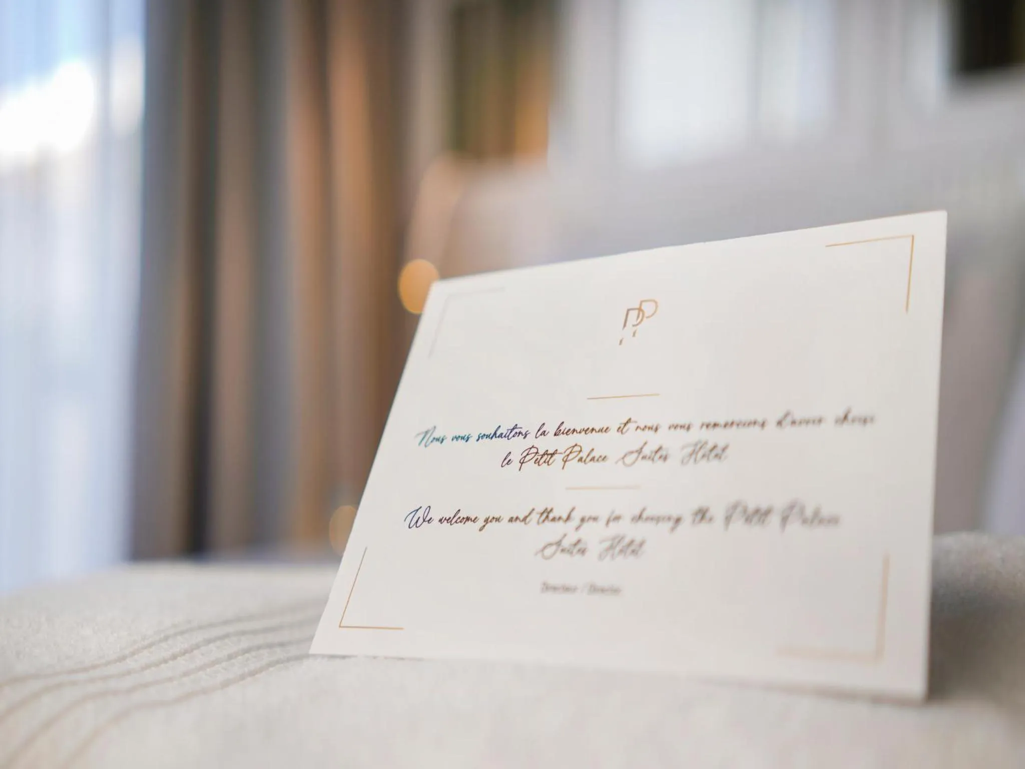 Bed in Petit Palace Suites Hotel