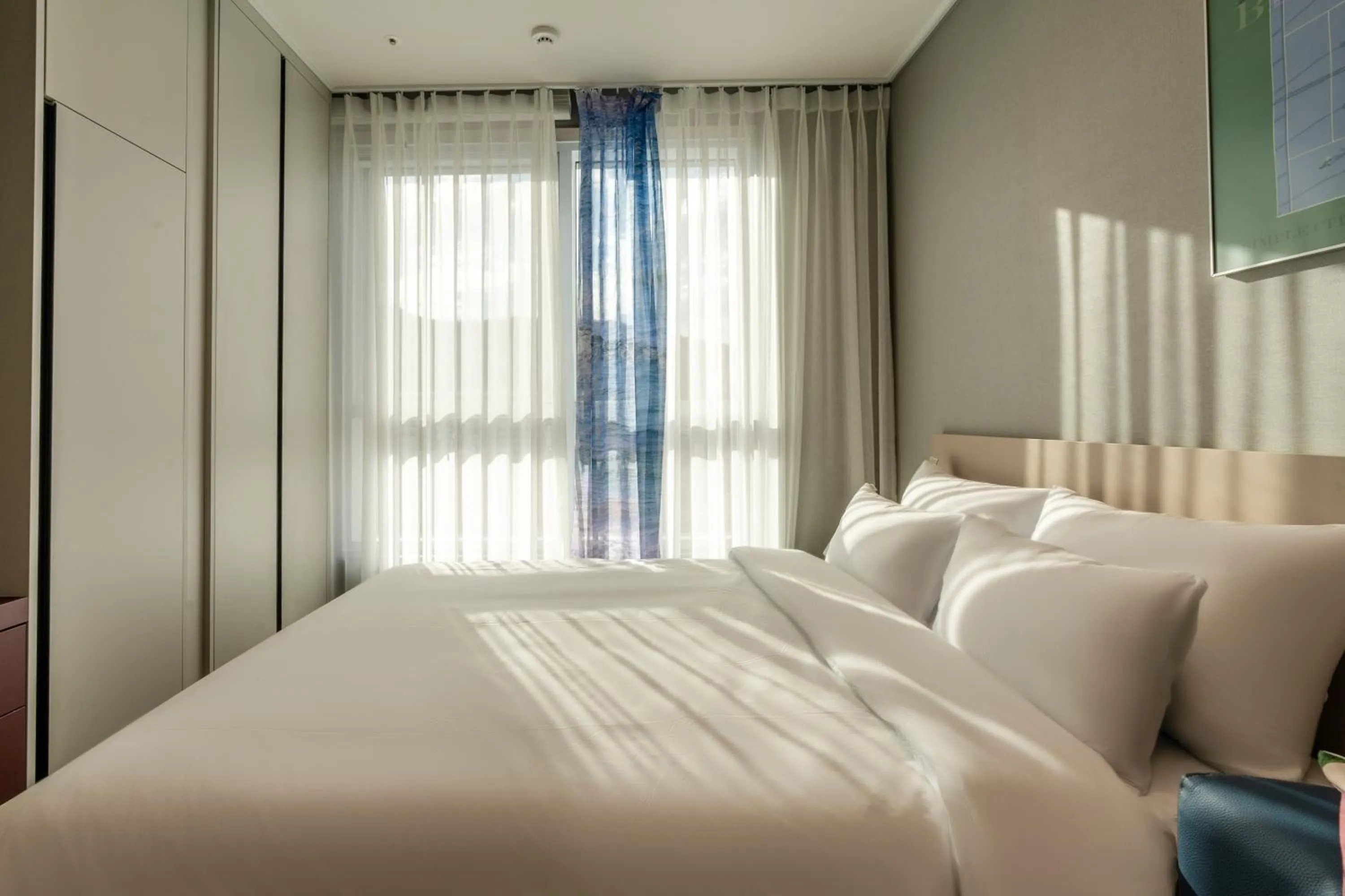 Bed in Radiant Nampo Hotel